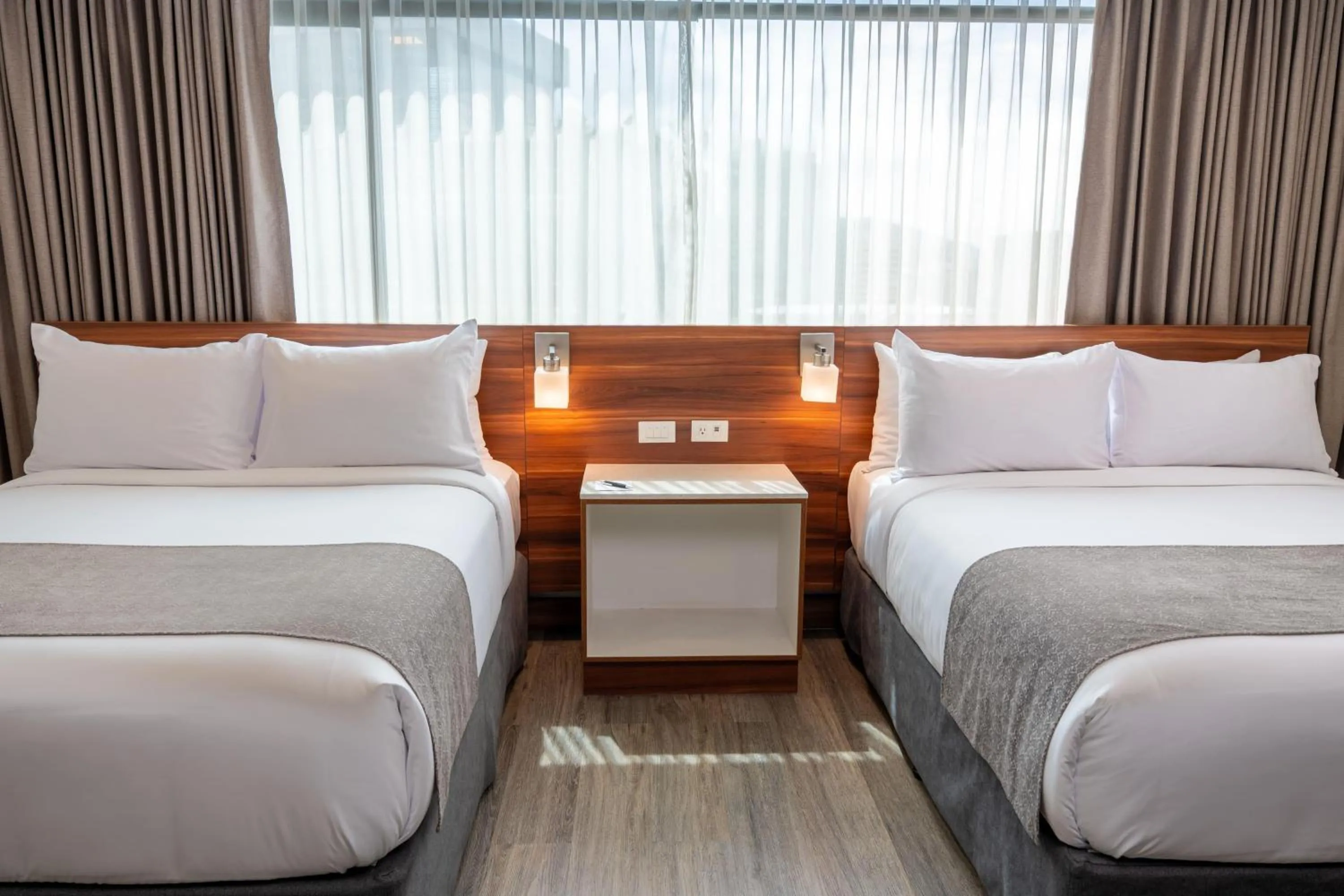 Photo of the whole room, Bed in Wyndham Garden Quito