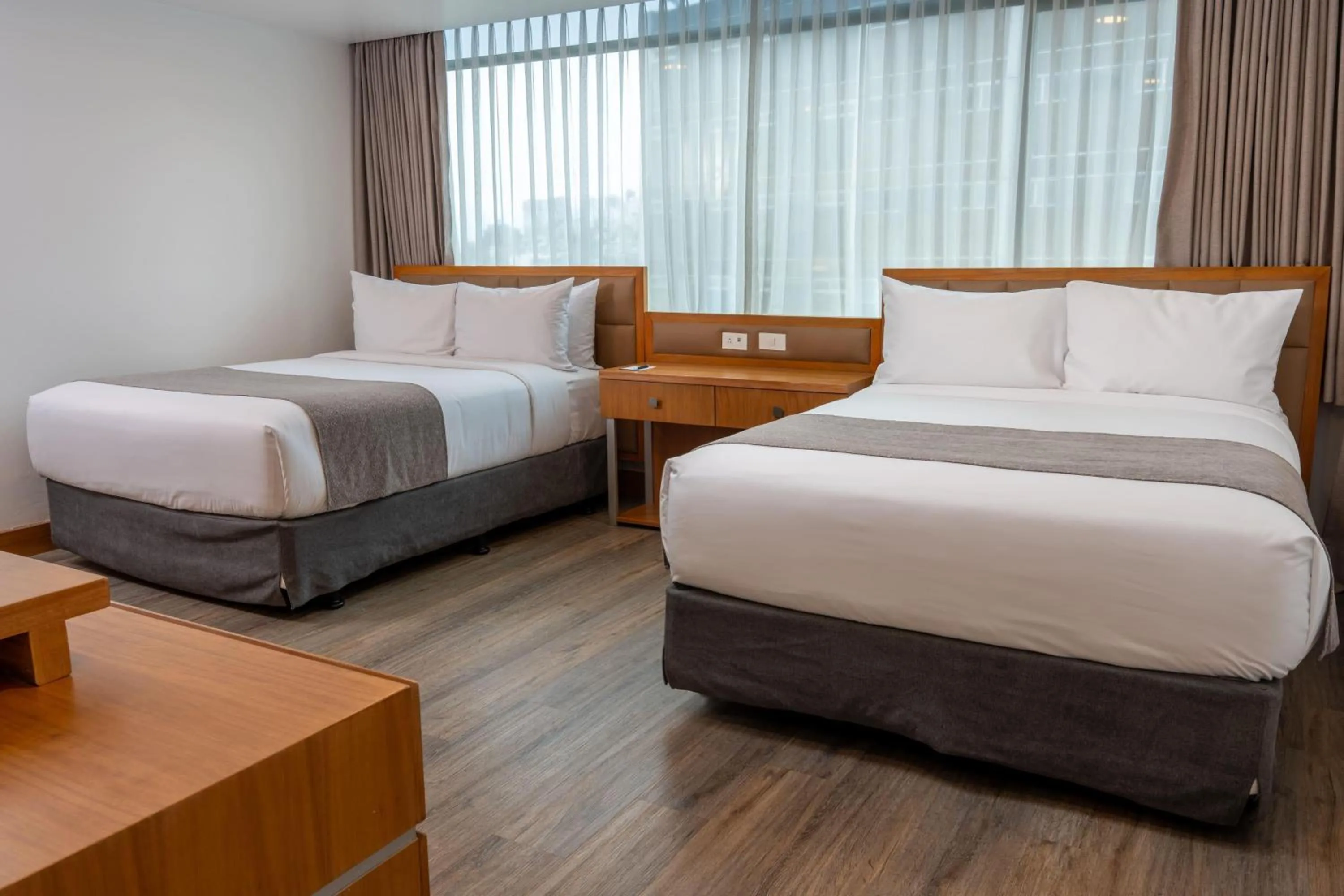 Photo of the whole room, Bed in Wyndham Garden Quito