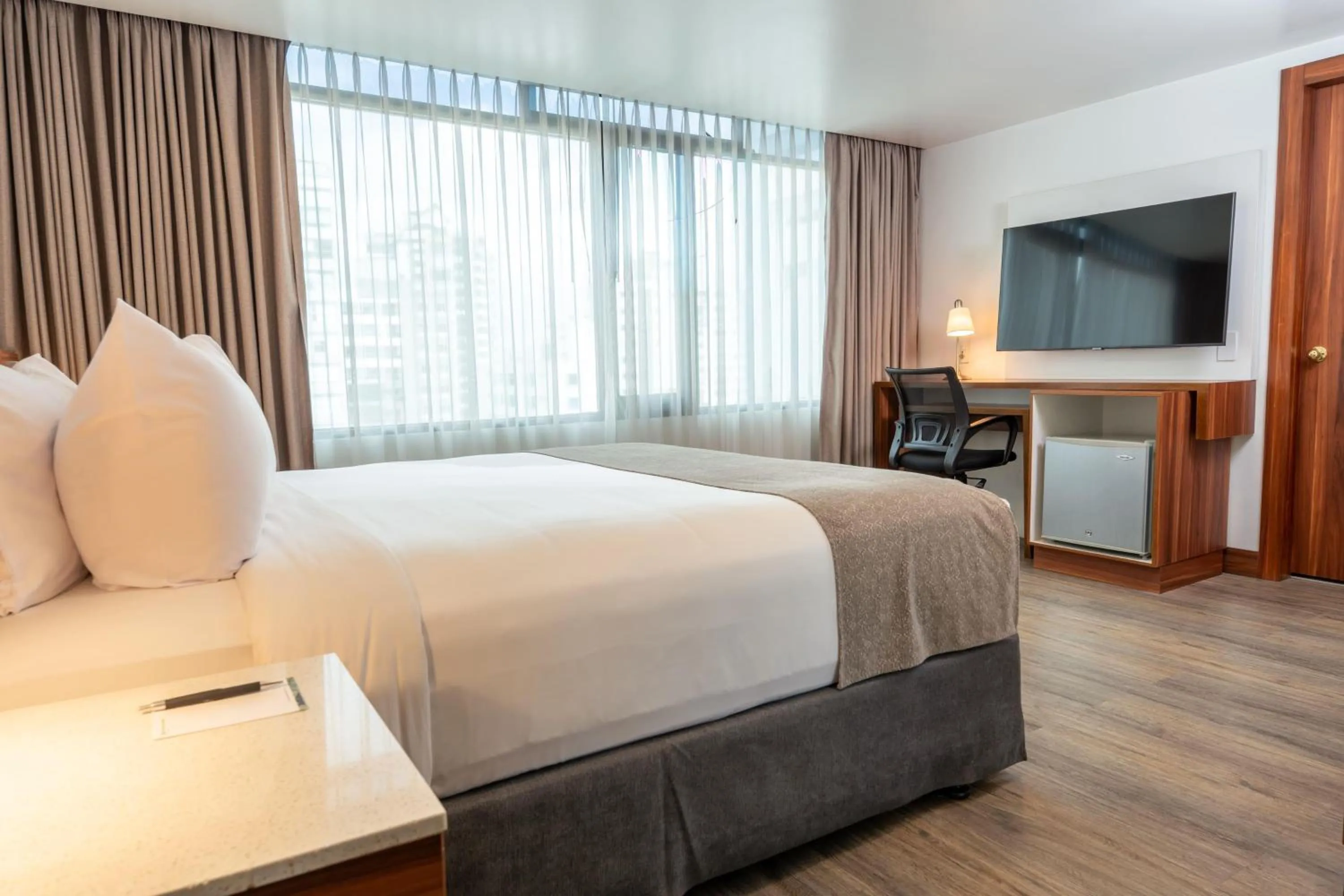 Photo of the whole room, Bed in Wyndham Garden Quito