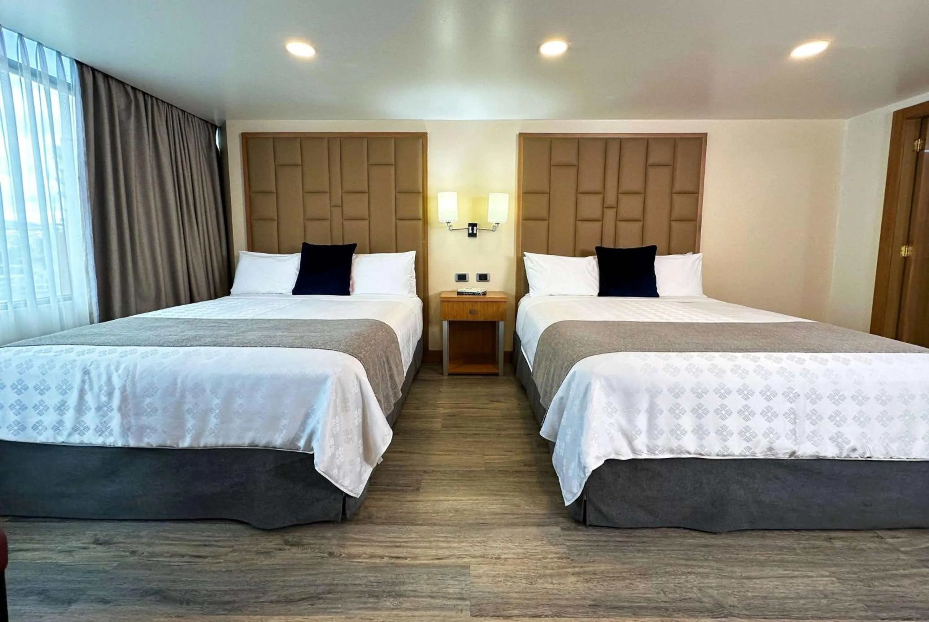 Photo of the whole room, Bed in Wyndham Garden Quito