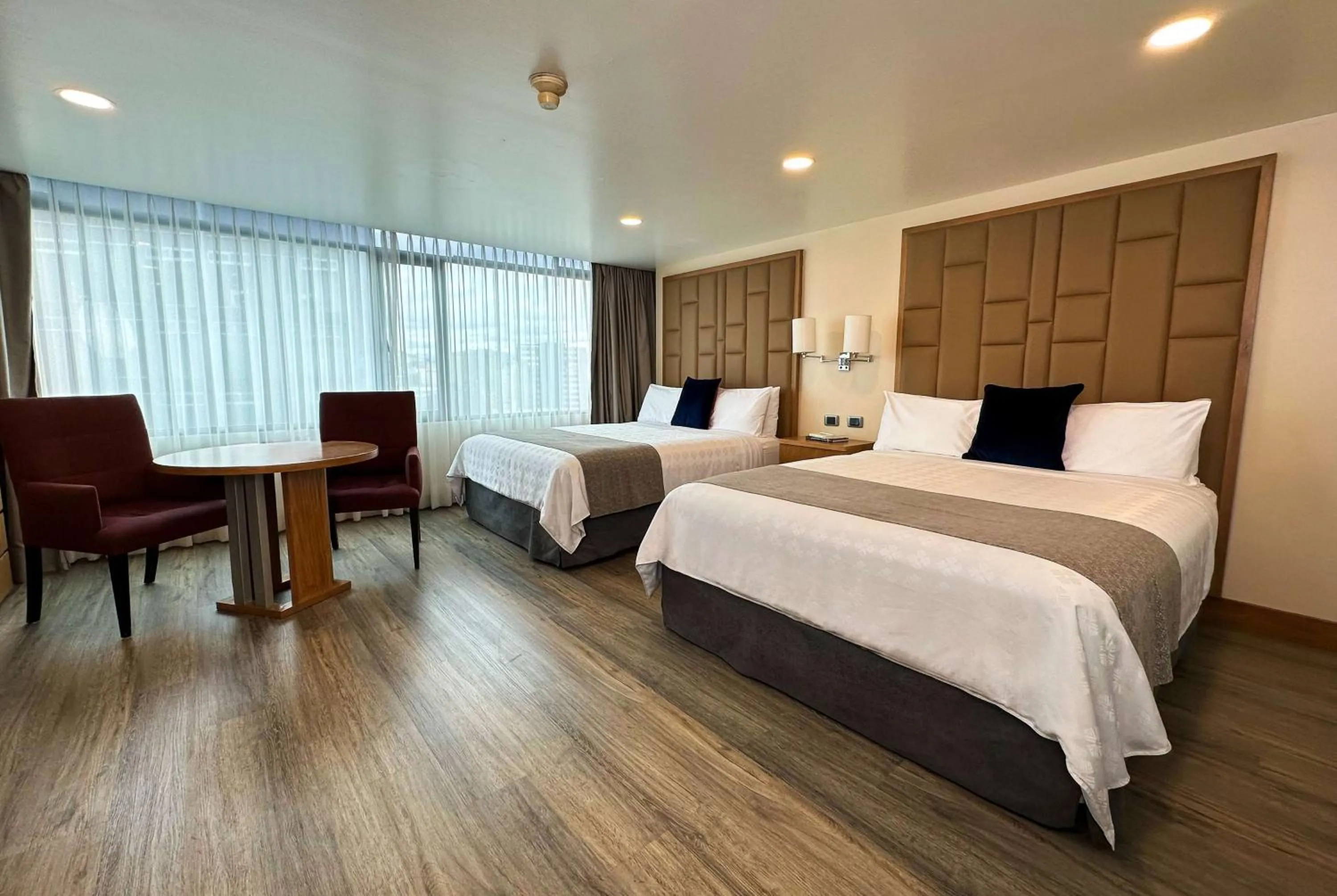 Photo of the whole room, Bed in Wyndham Garden Quito