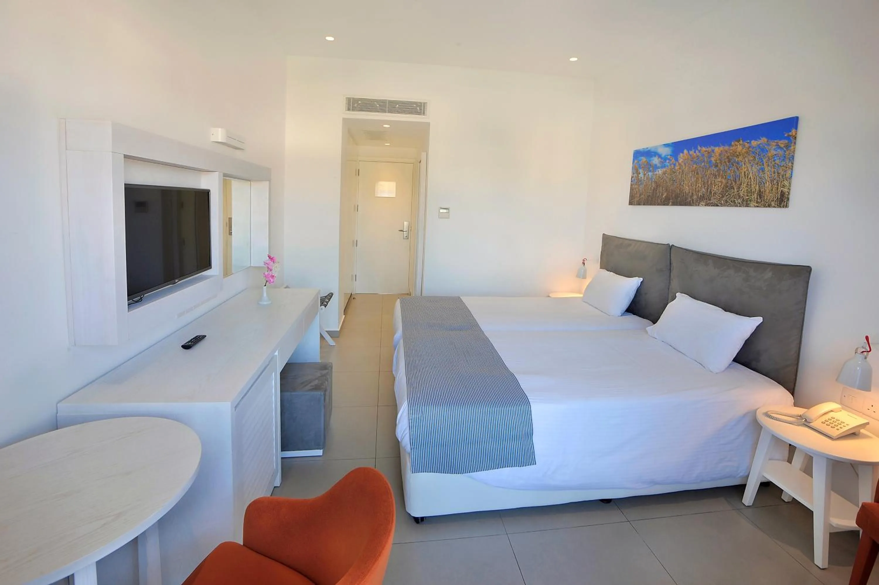 Photo of the whole room, Bed in Nissiana Hotel & Bungalows