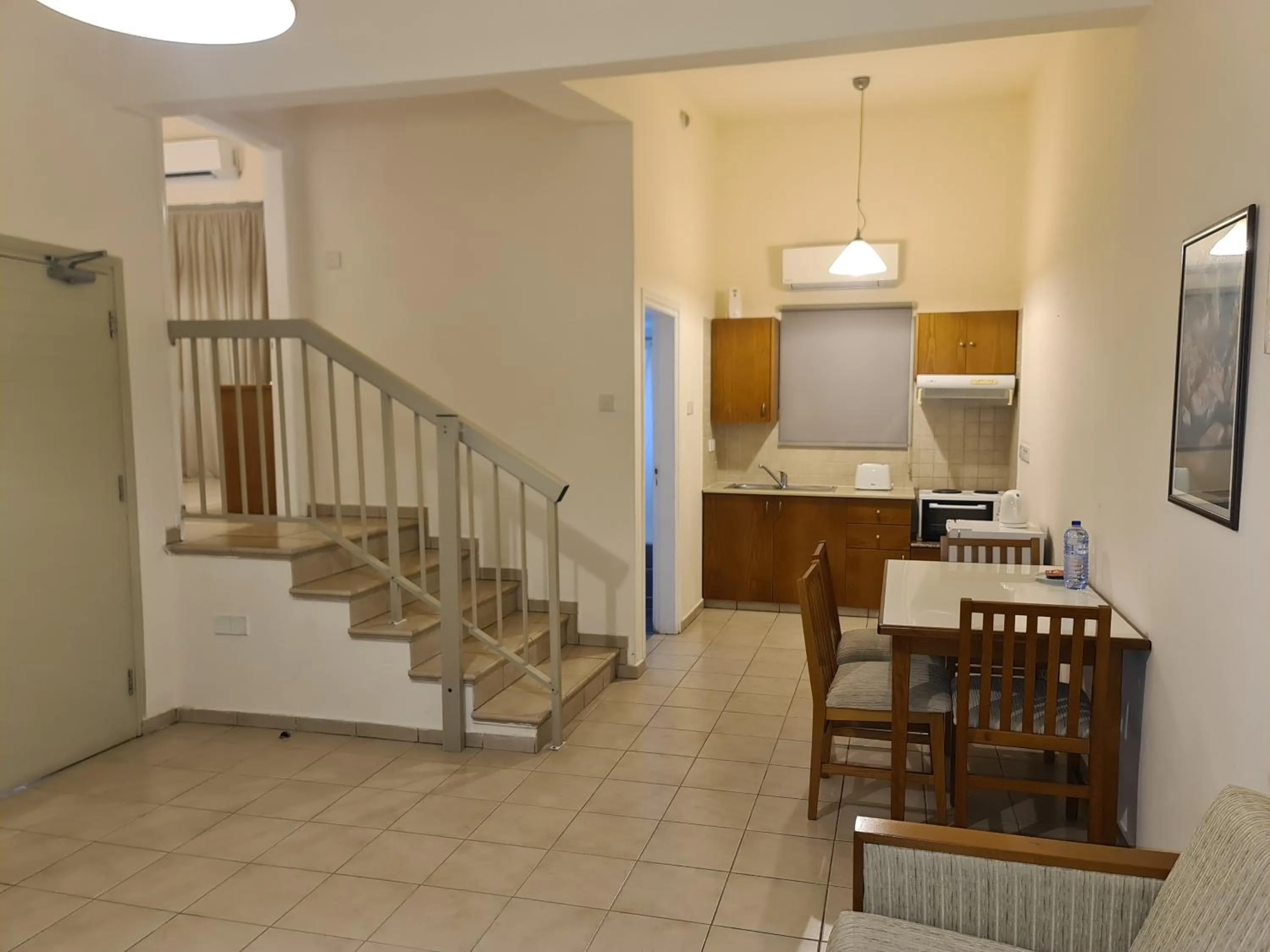 Kitchen or kitchenette in Nissiana Hotel & Bungalows