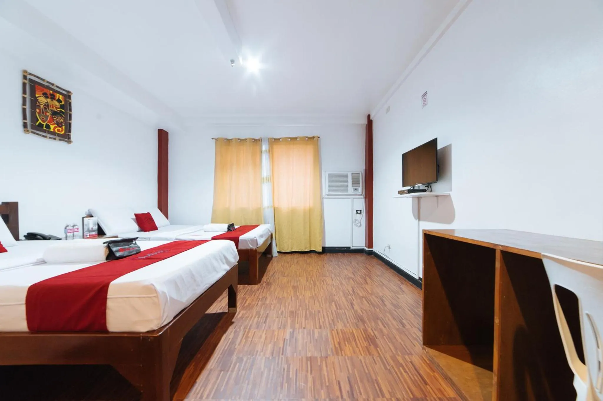 TV and multimedia, Bed in RedDoorz at Nirvana Pension House