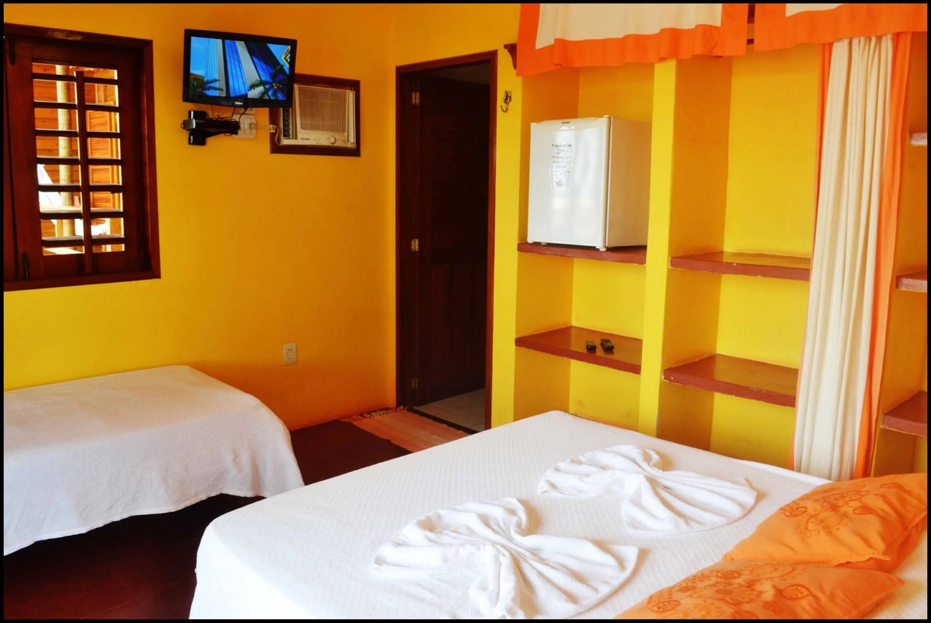 Bed in Pousada Sahara