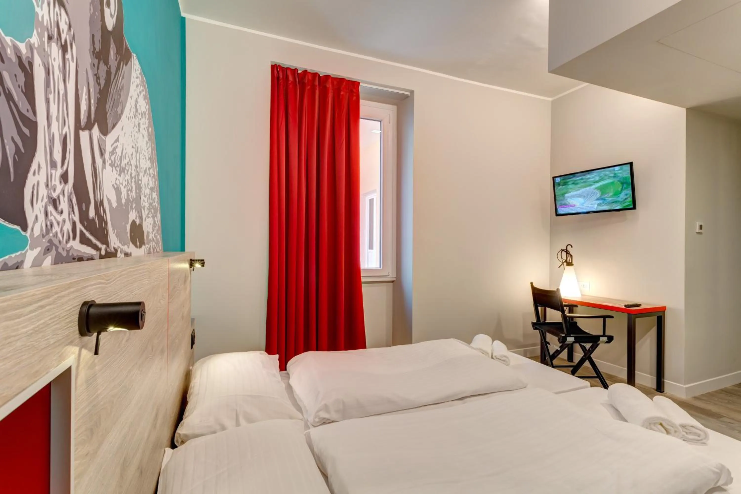 Photo of the whole room, Bed in MEININGER Roma Termini