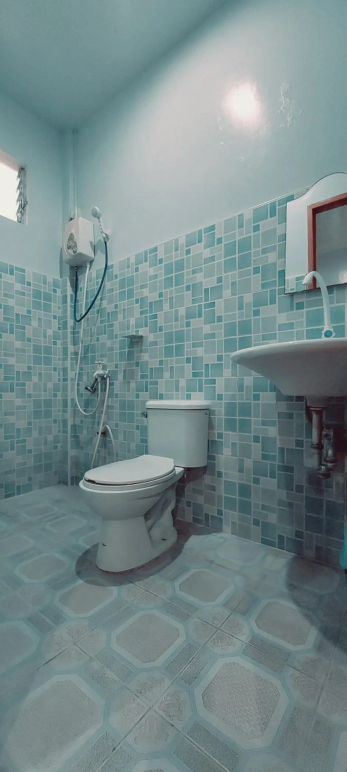 Toilet in Genna's Tourist Inn Santa Fe