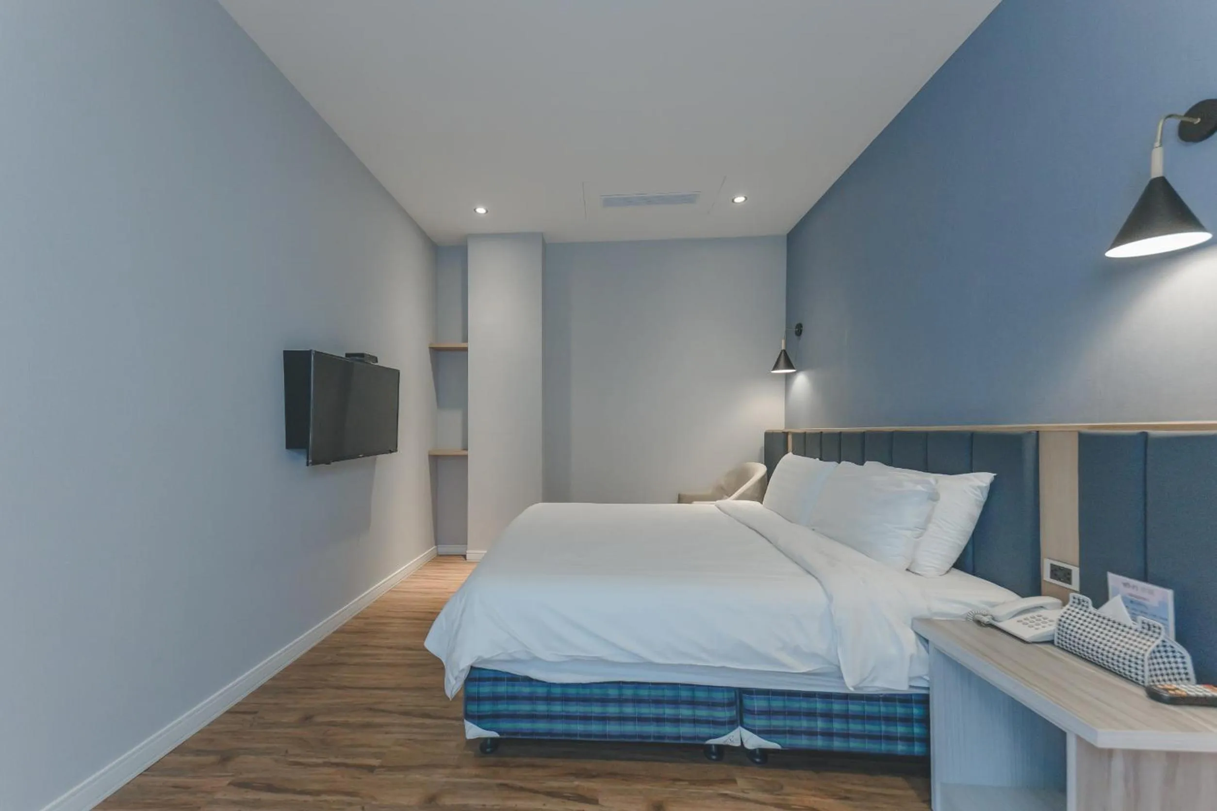 Bed in Sunshine Palm B&B