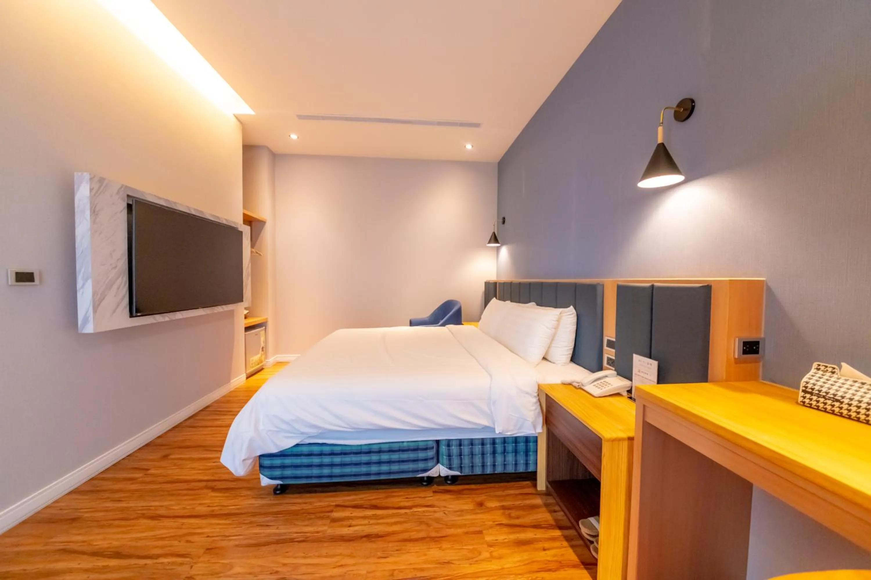 Bed in Sunshine Palm B&B