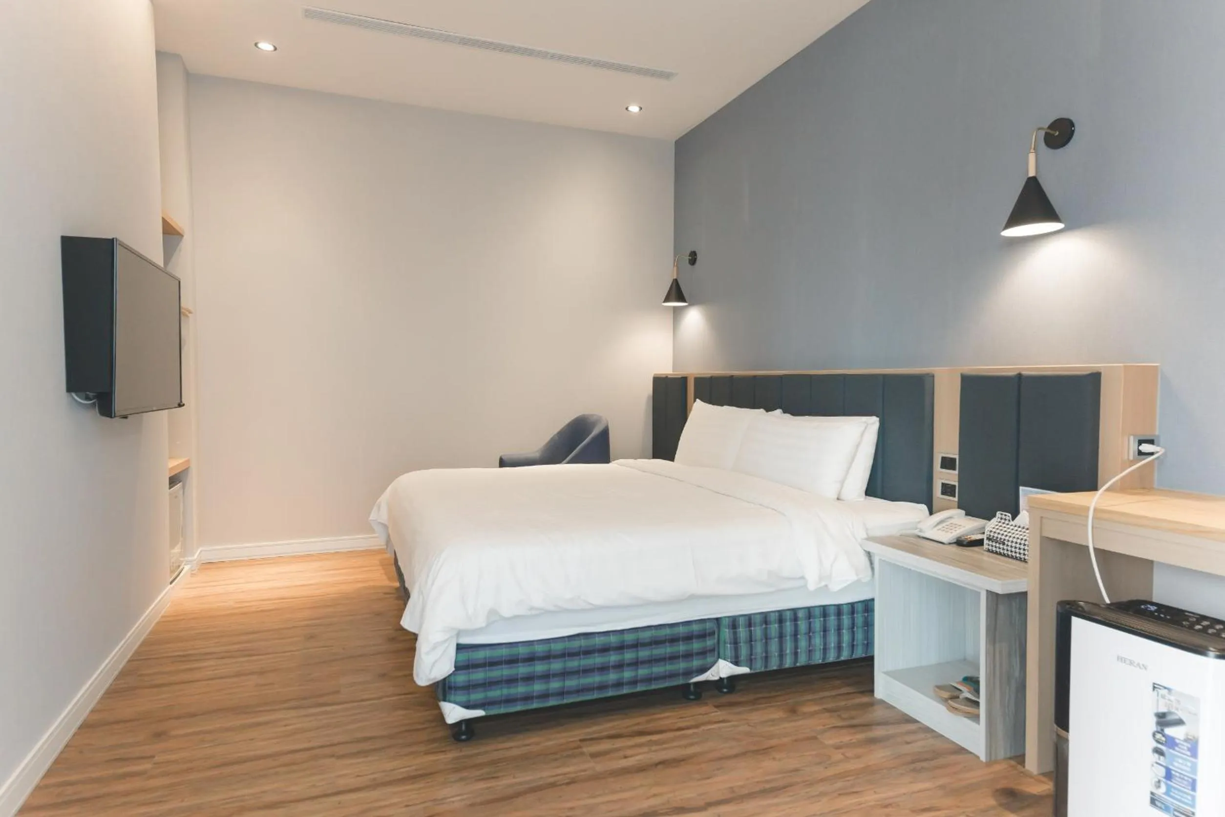 Bed in Sunshine Palm B&B