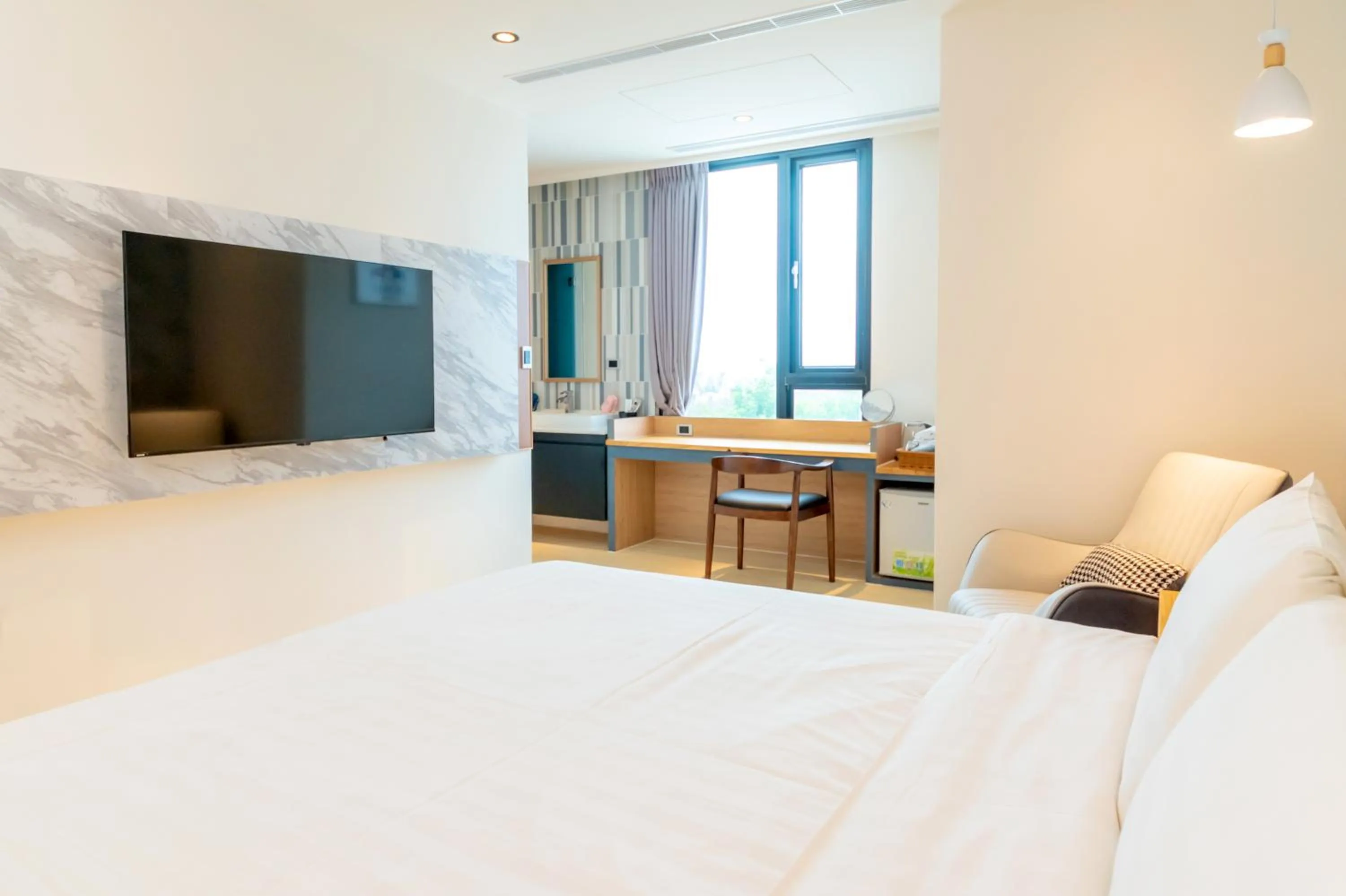 Bed in Sunshine Palm B&B