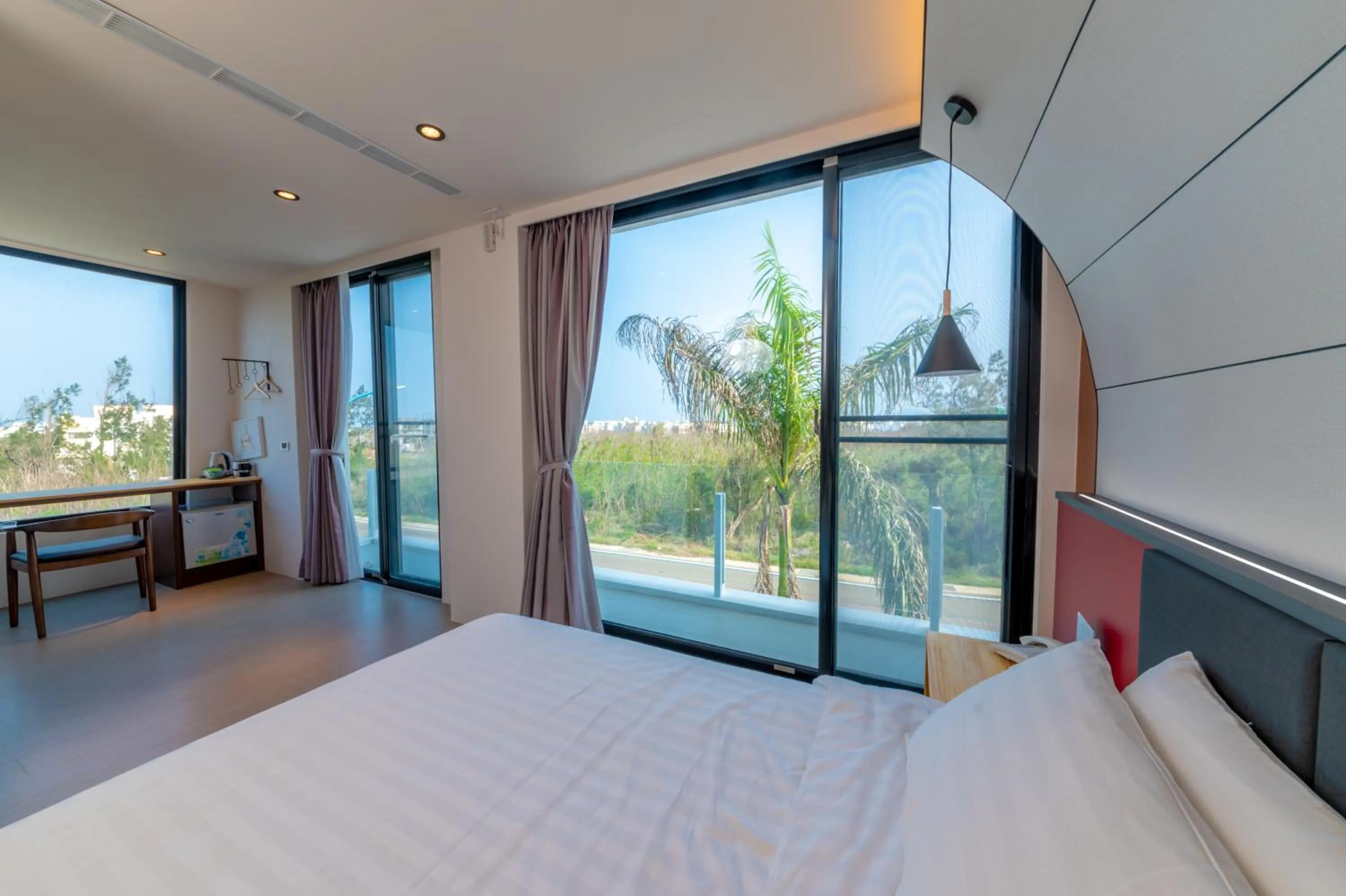 Bed in Sunshine Palm B&B