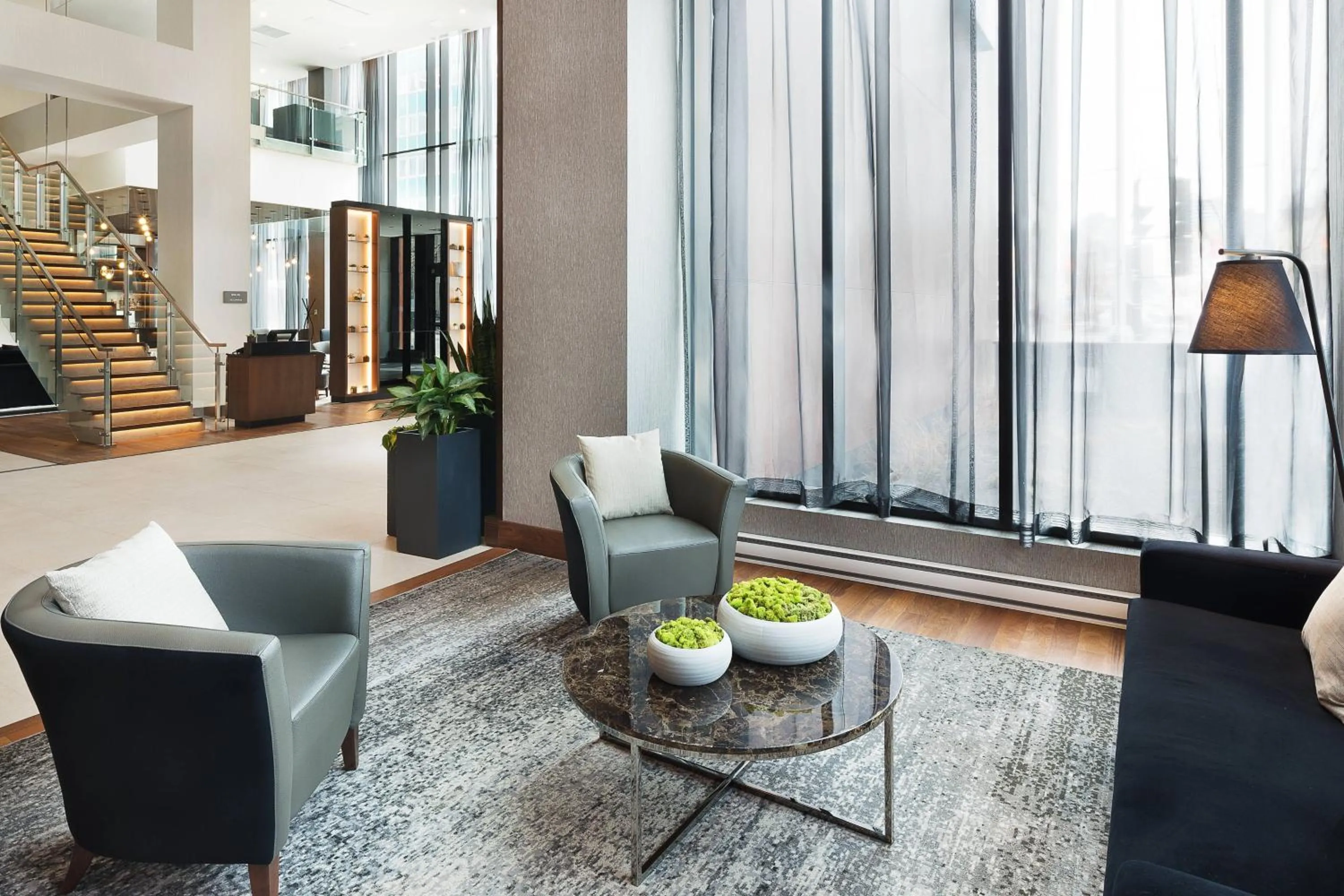 Lobby or reception in Hôtel AC Montréal Centre-ville