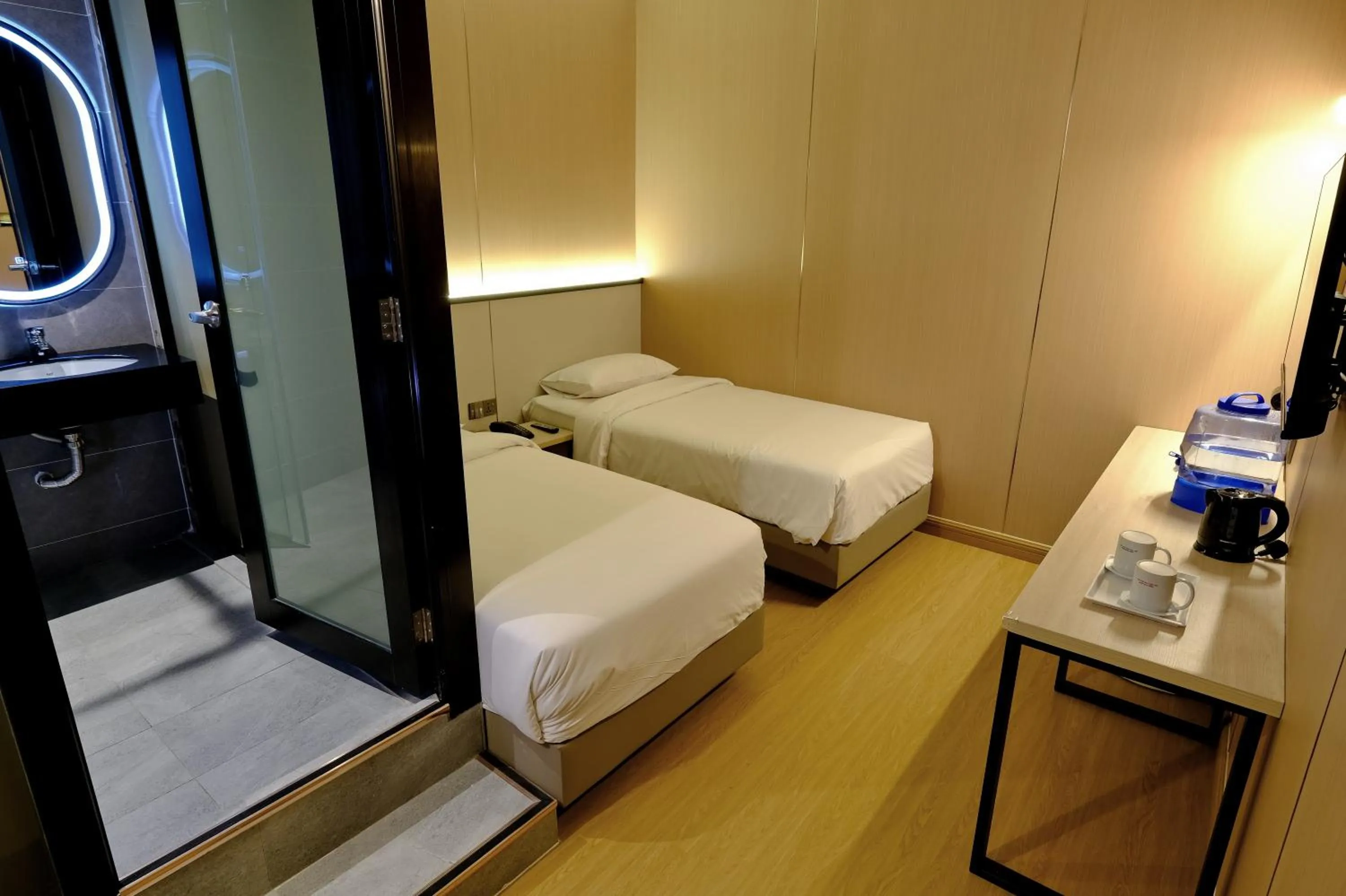 Bed in Ming Paragon Hotel