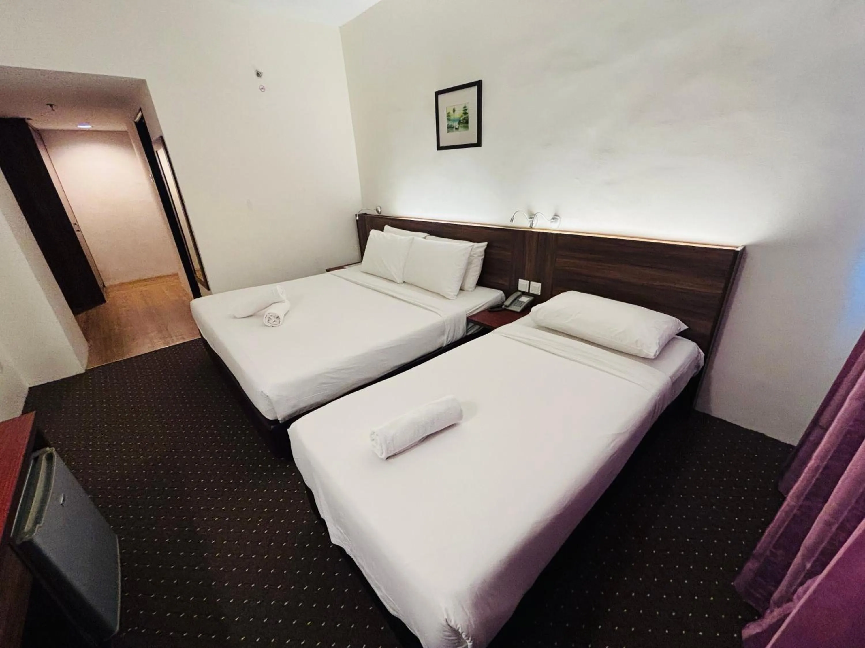 Bed in Hotel Yt Midtown Kuala Terengganu