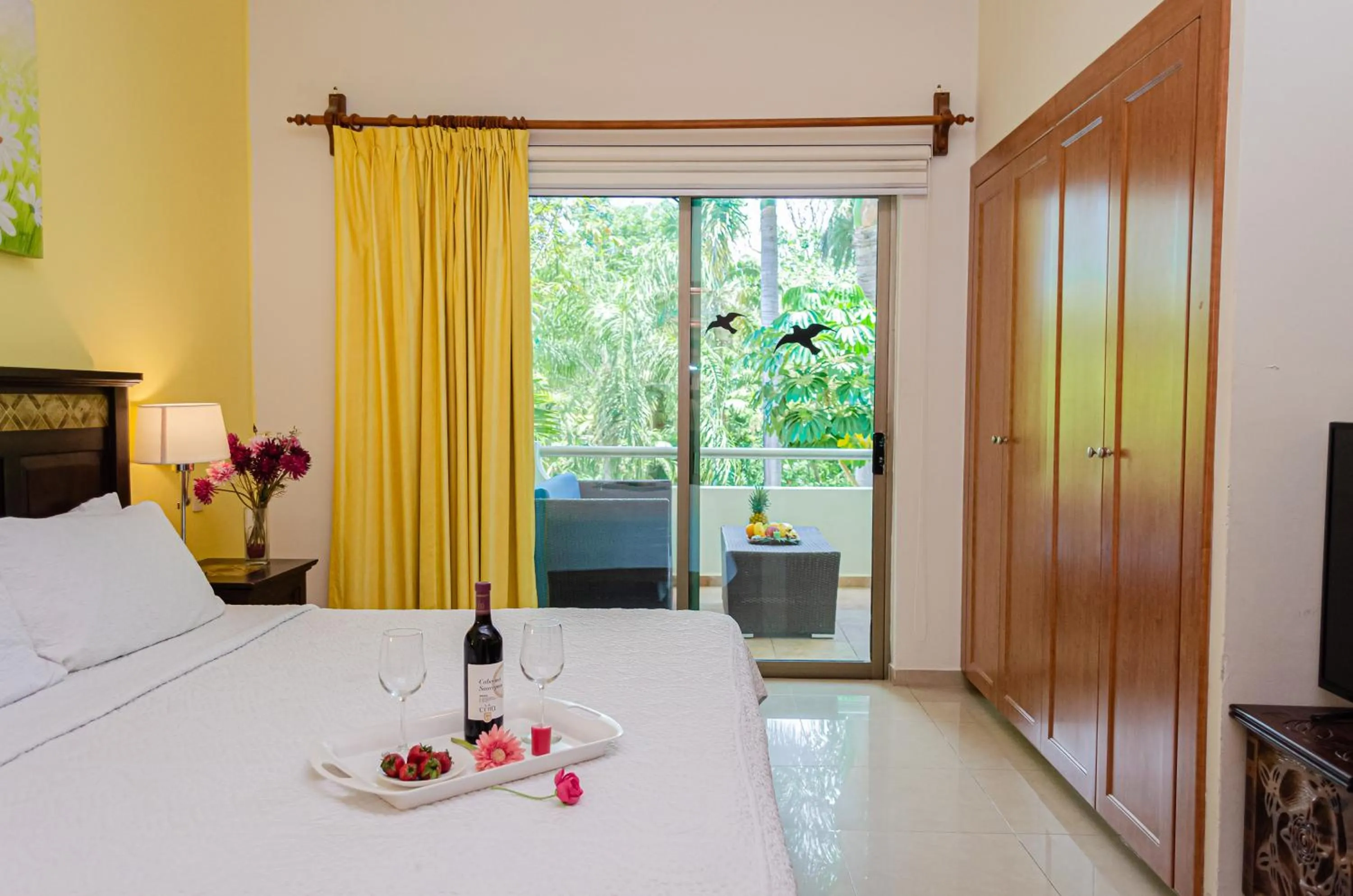 Bed in Riviera Maya Suites