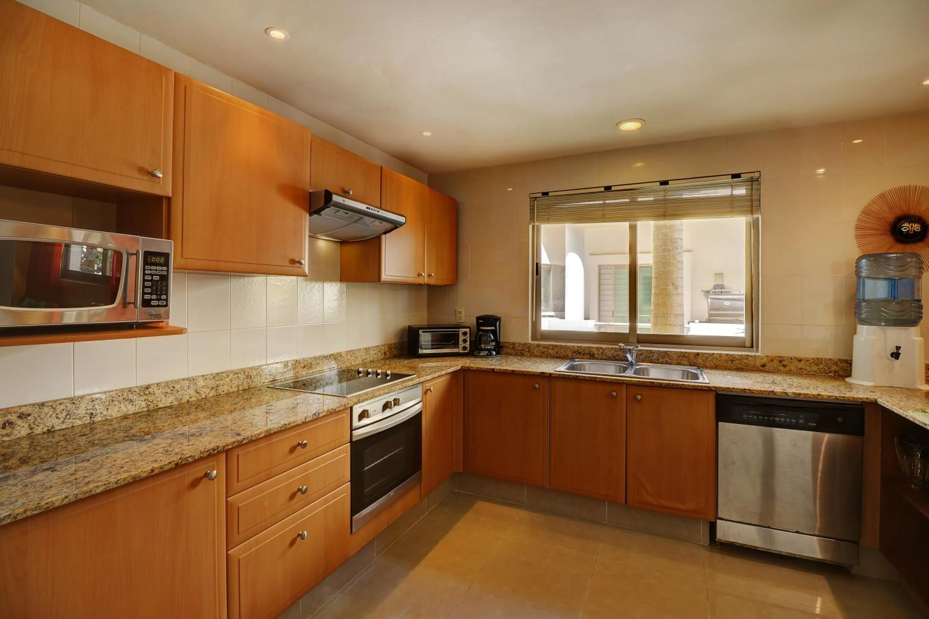 Kitchen or kitchenette in Riviera Maya Suites