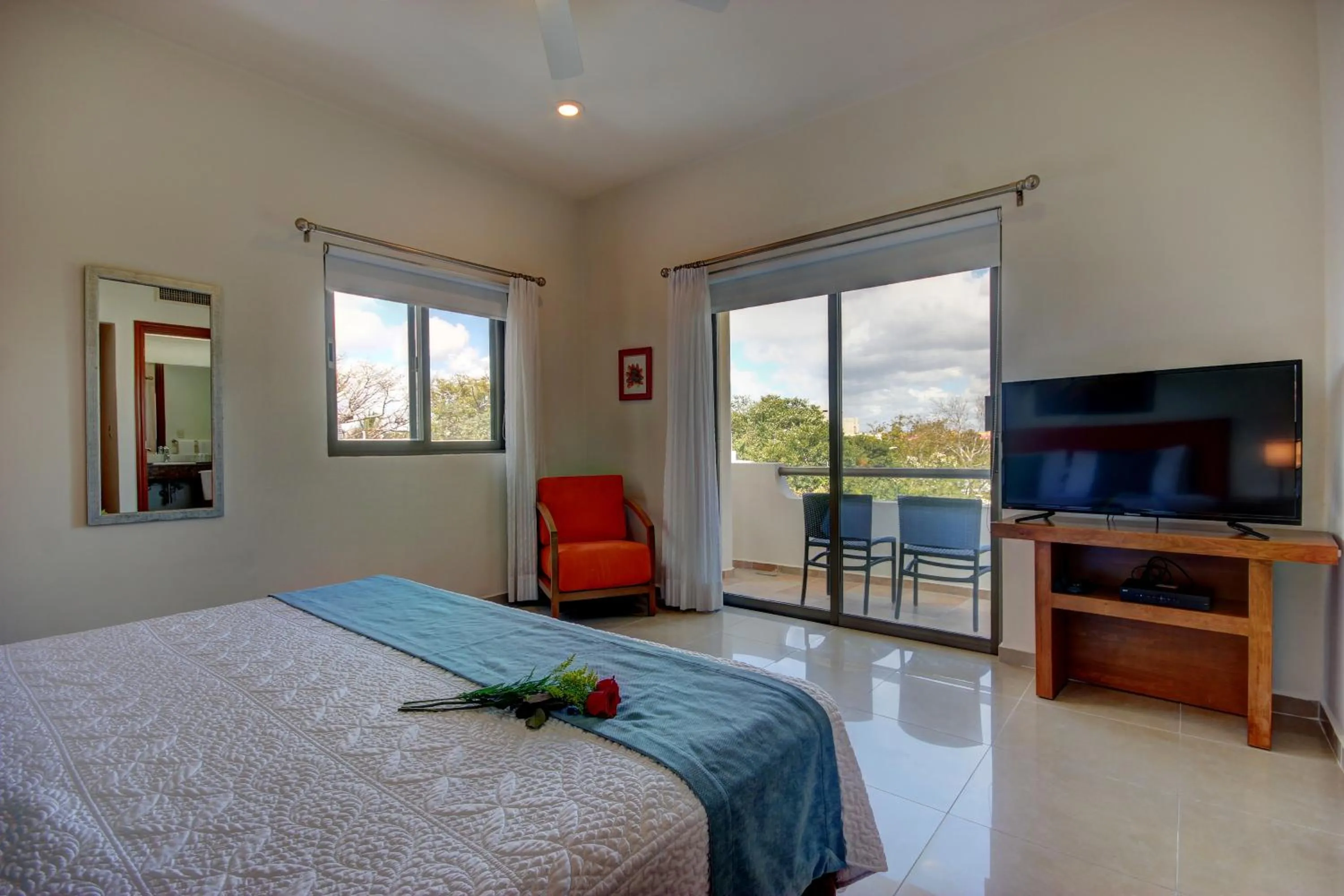 Bed in Riviera Maya Suites