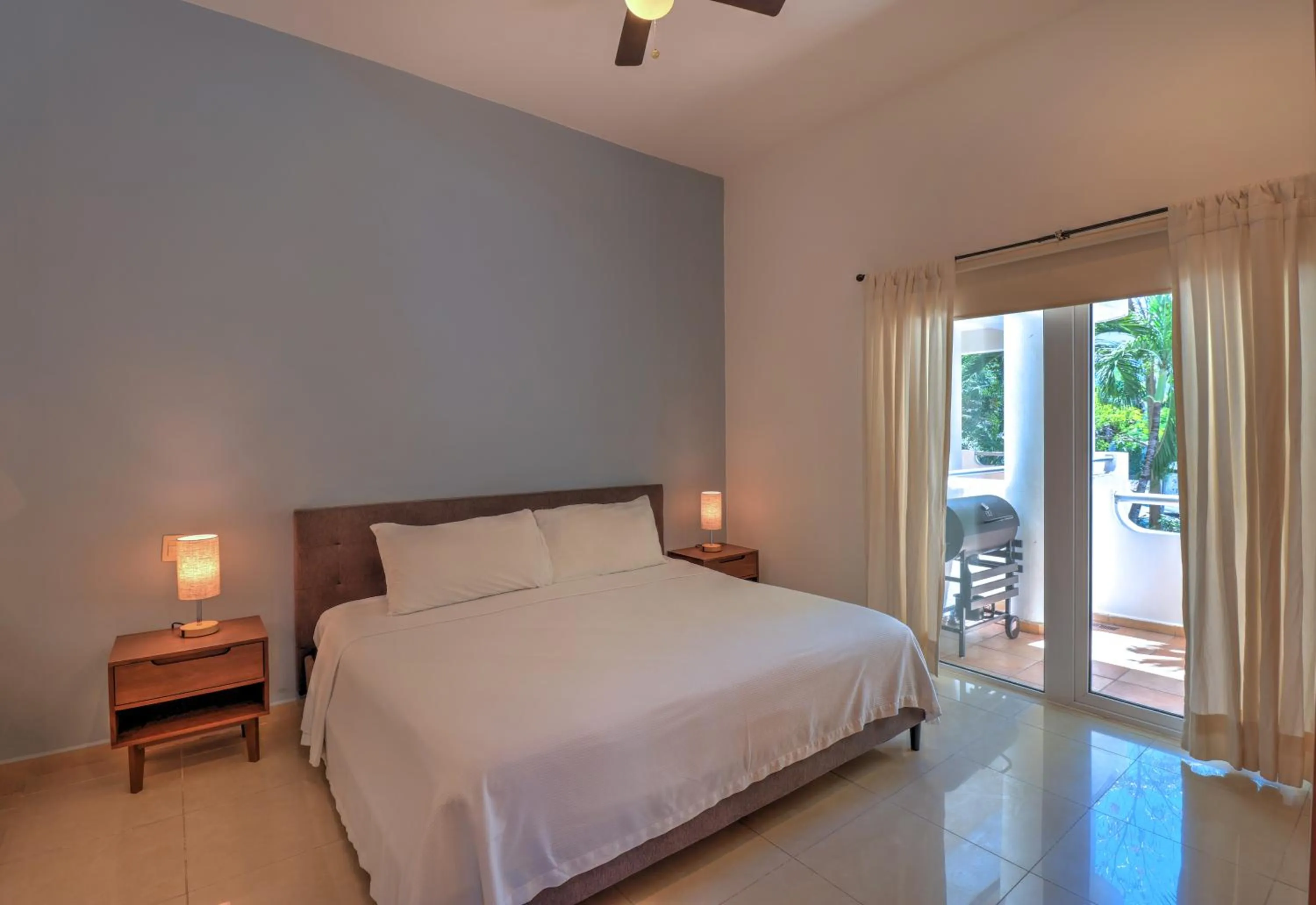 Bed in Riviera Maya Suites