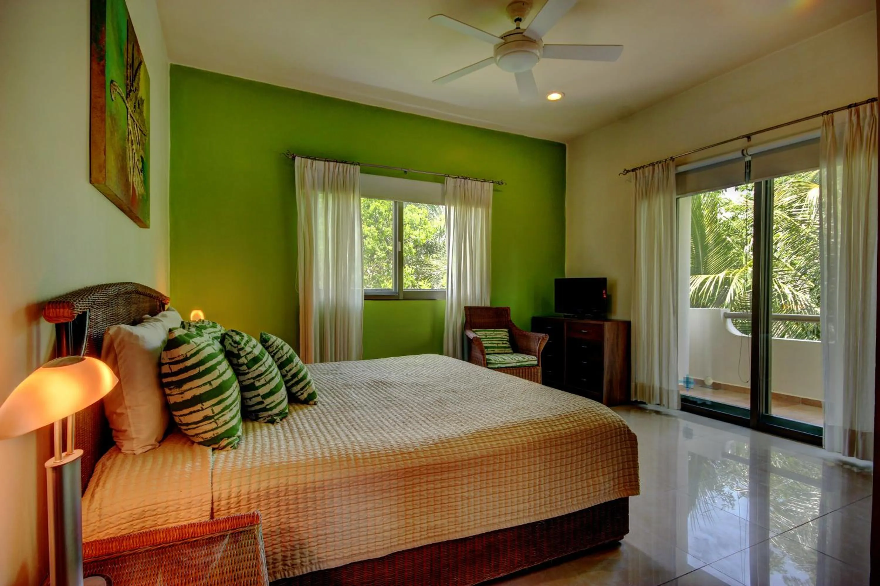 Bed in Riviera Maya Suites