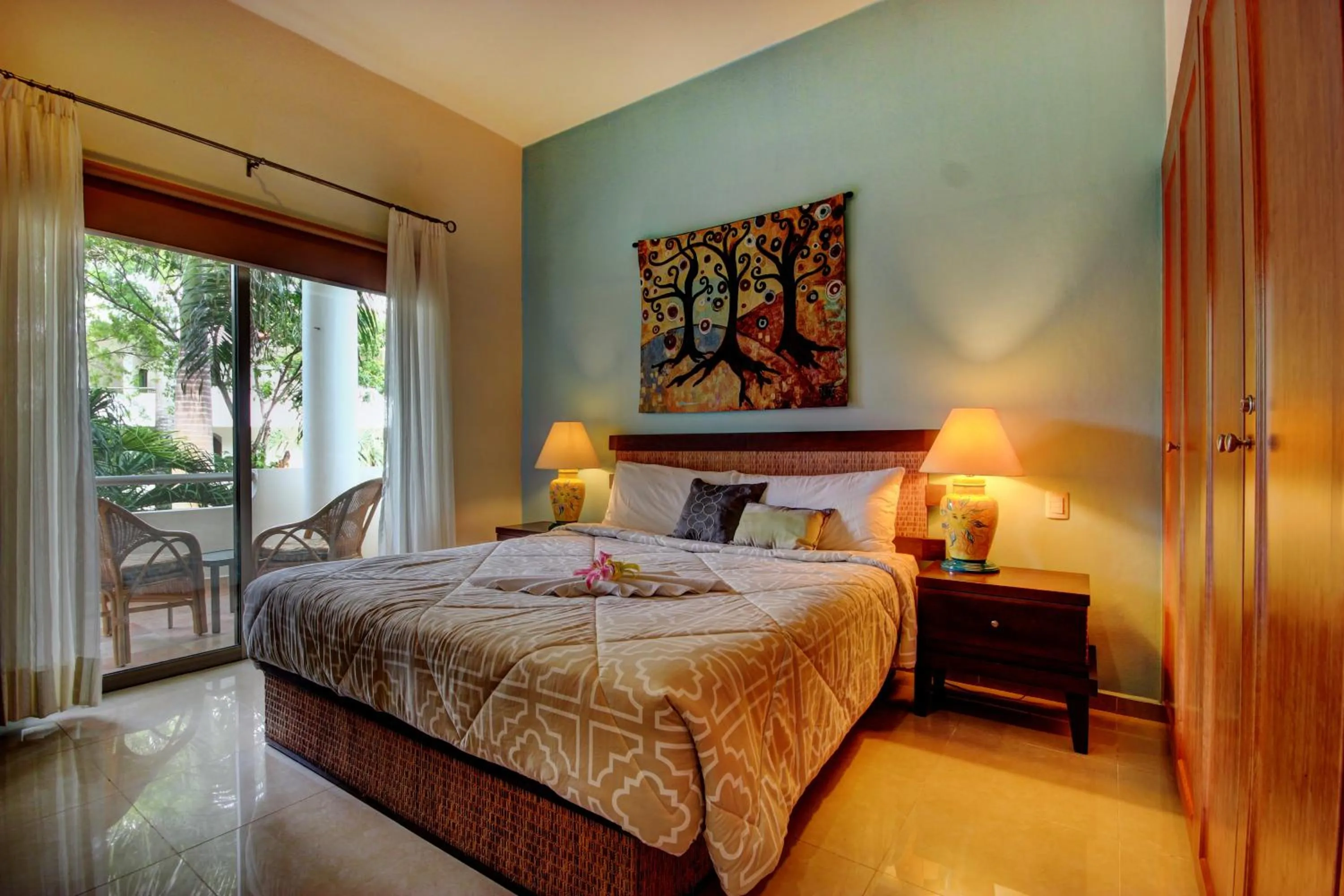Bed in Riviera Maya Suites