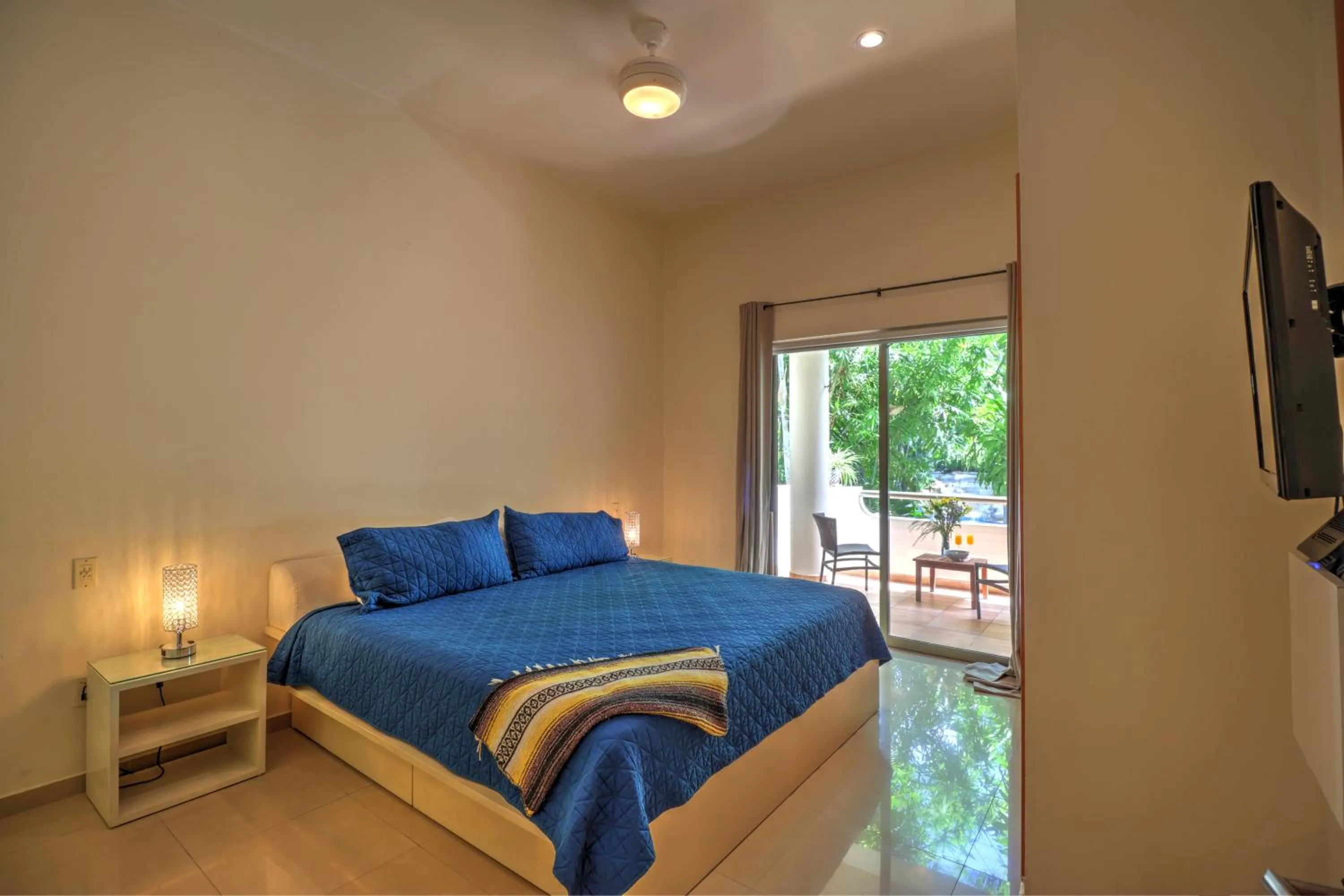 Bed in Riviera Maya Suites