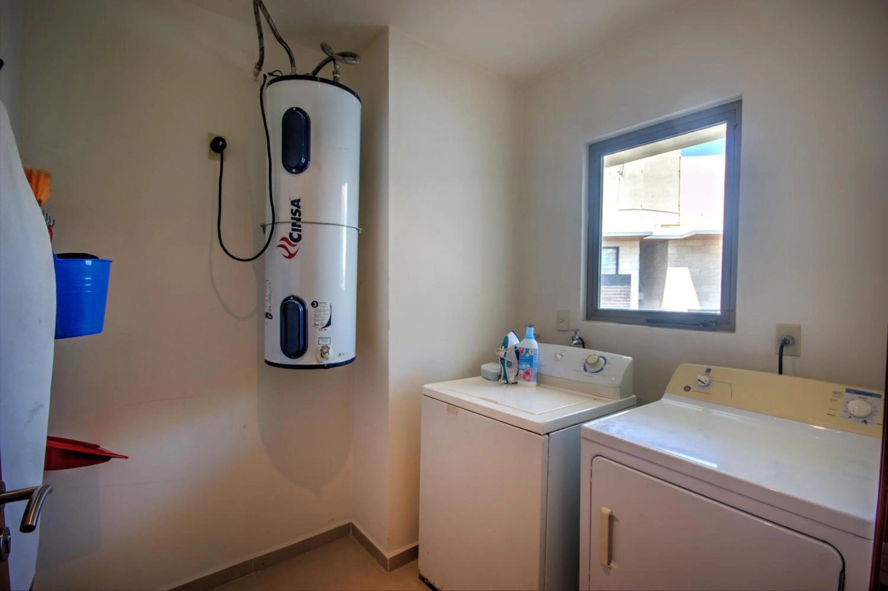 washing machine in Riviera Maya Suites