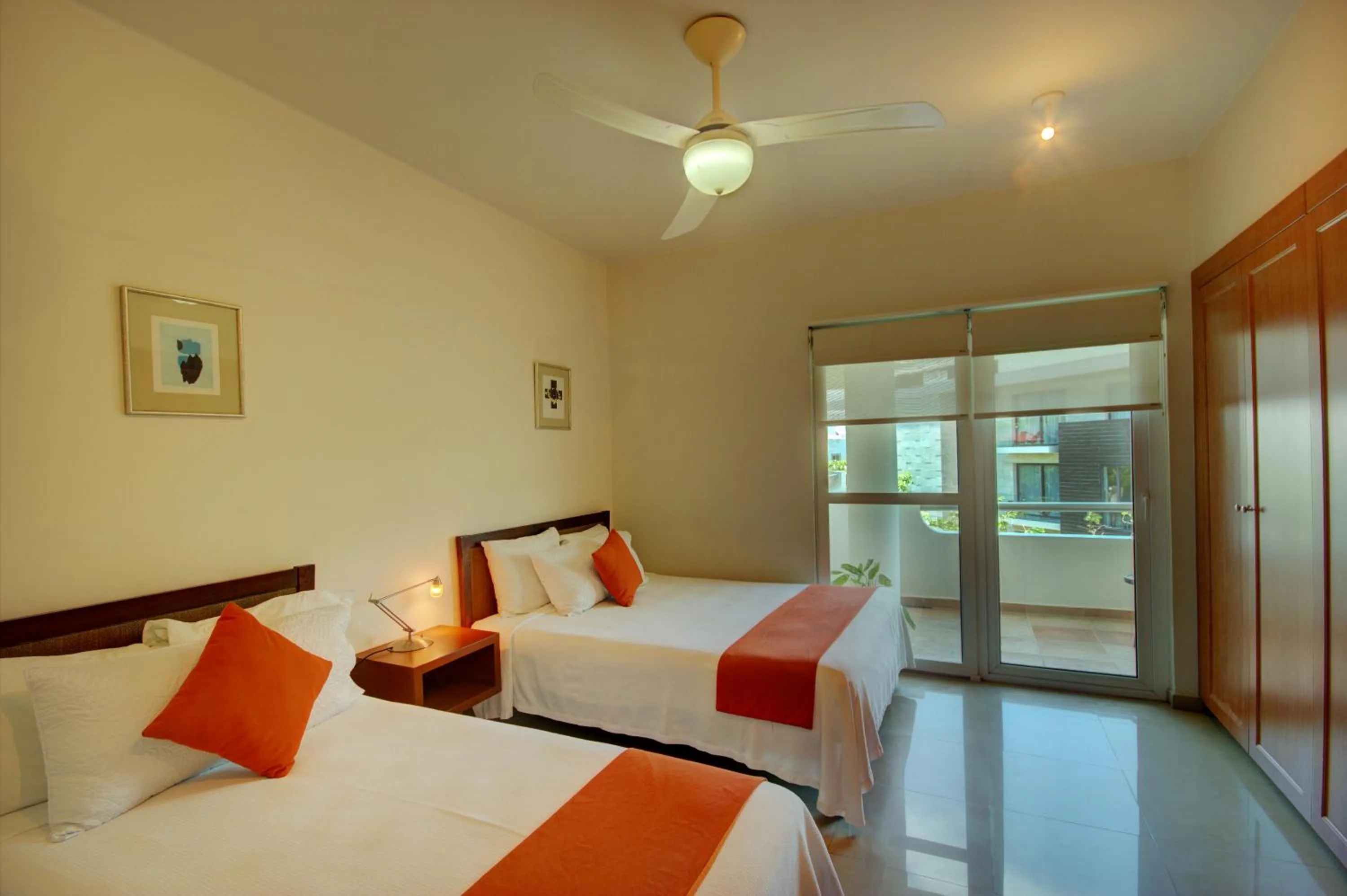 Bed in Riviera Maya Suites