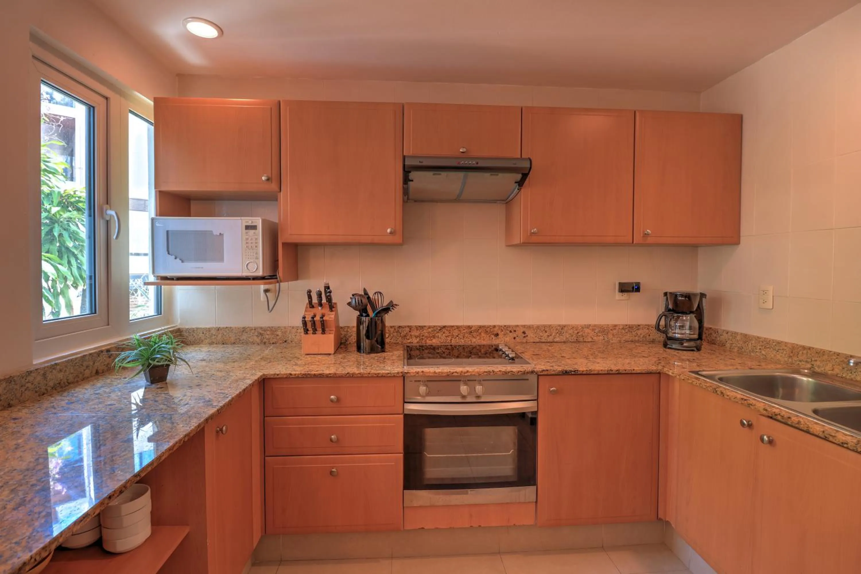 Kitchen or kitchenette in Riviera Maya Suites