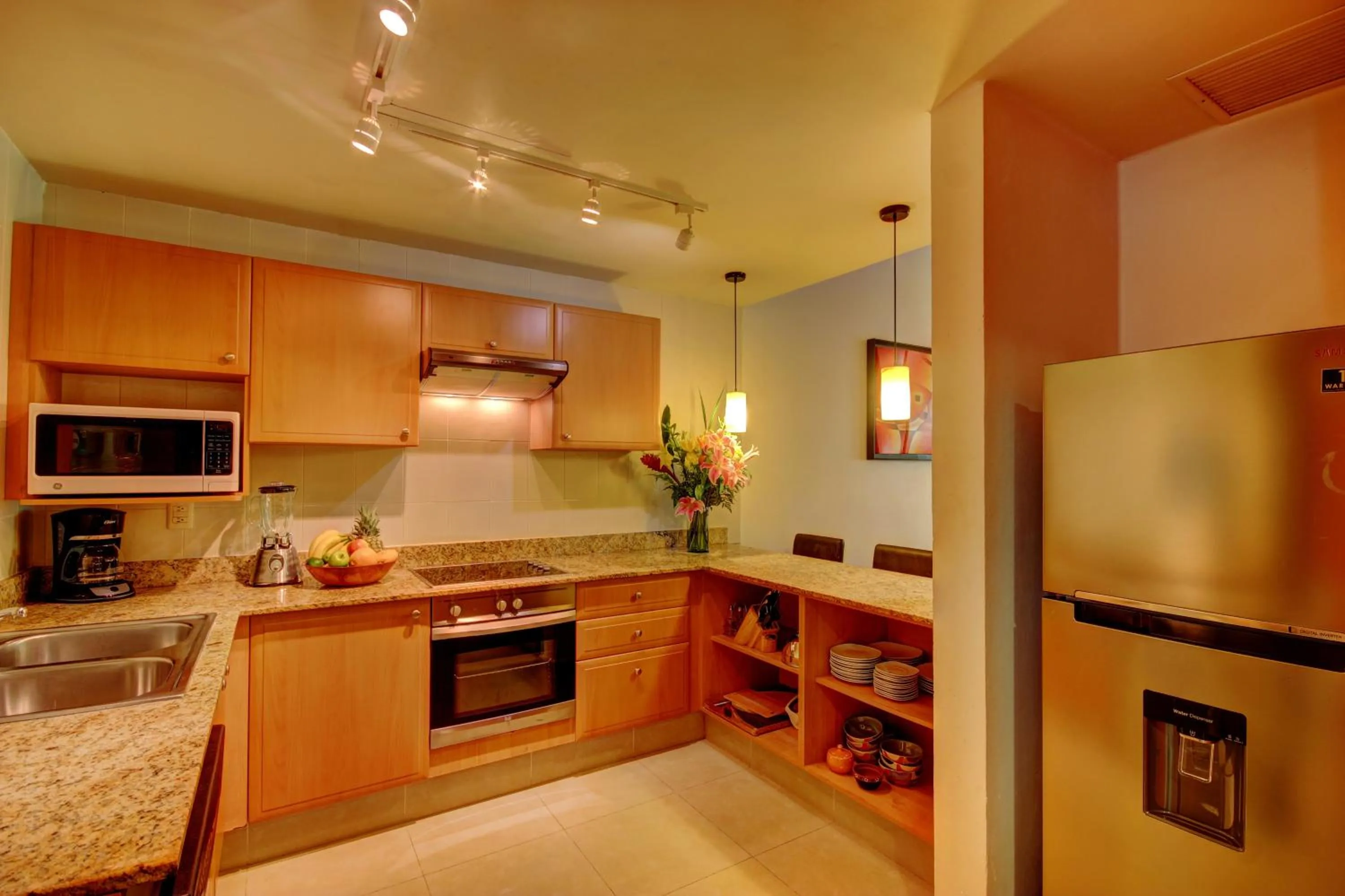 Kitchen or kitchenette in Riviera Maya Suites