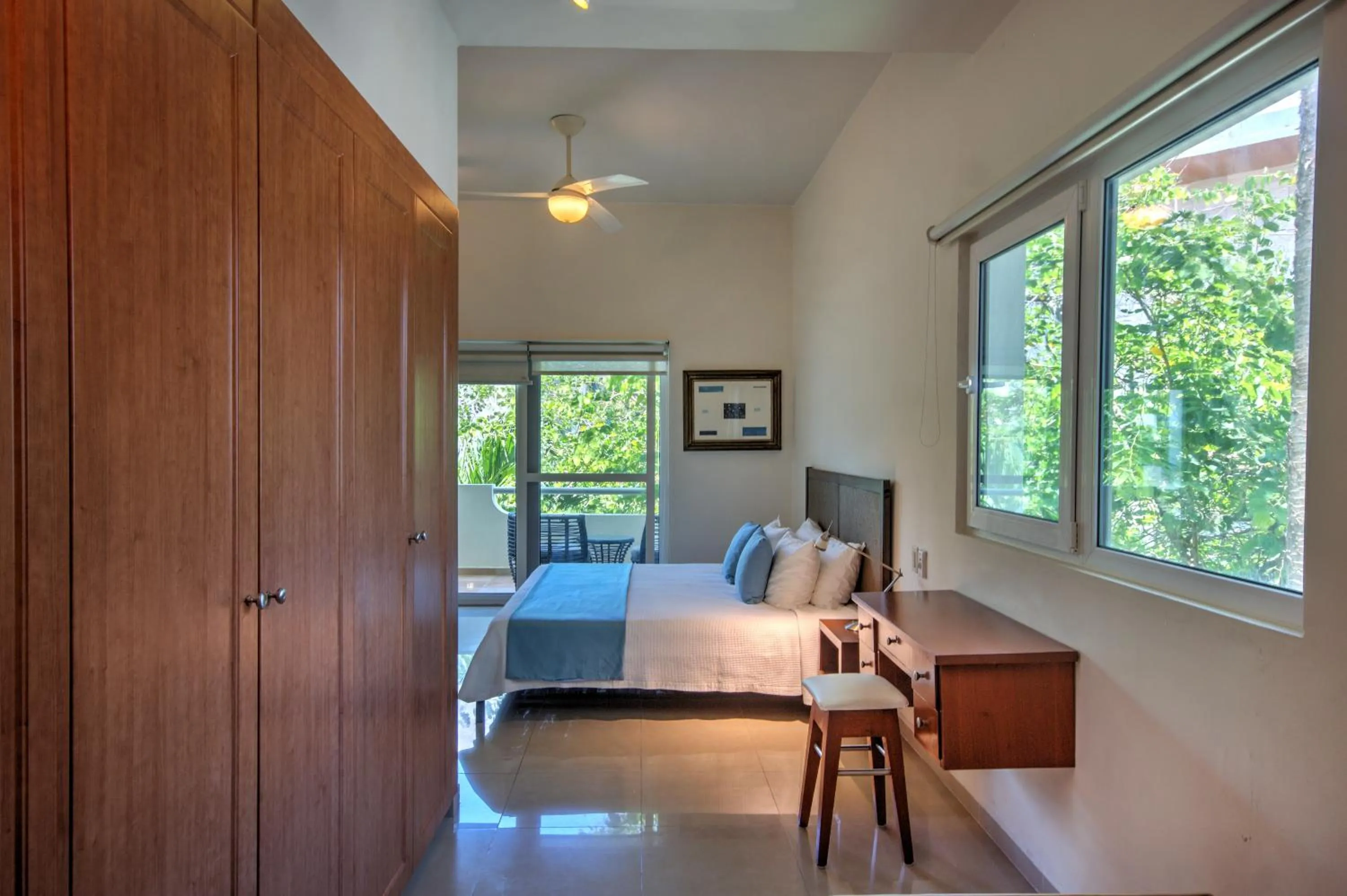 Bed in Riviera Maya Suites