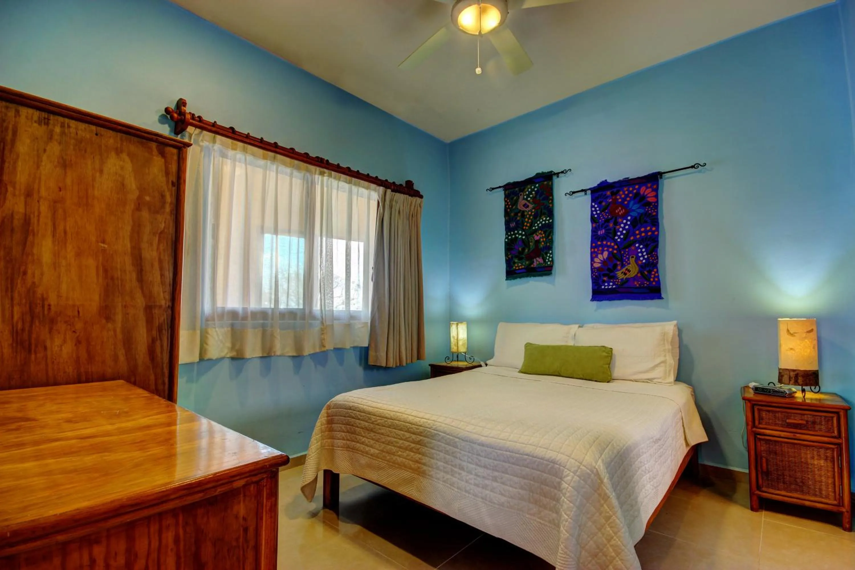 Bed in Riviera Maya Suites