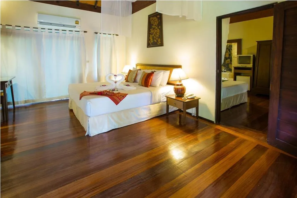 Bed in Golden Pine Resort and Spa