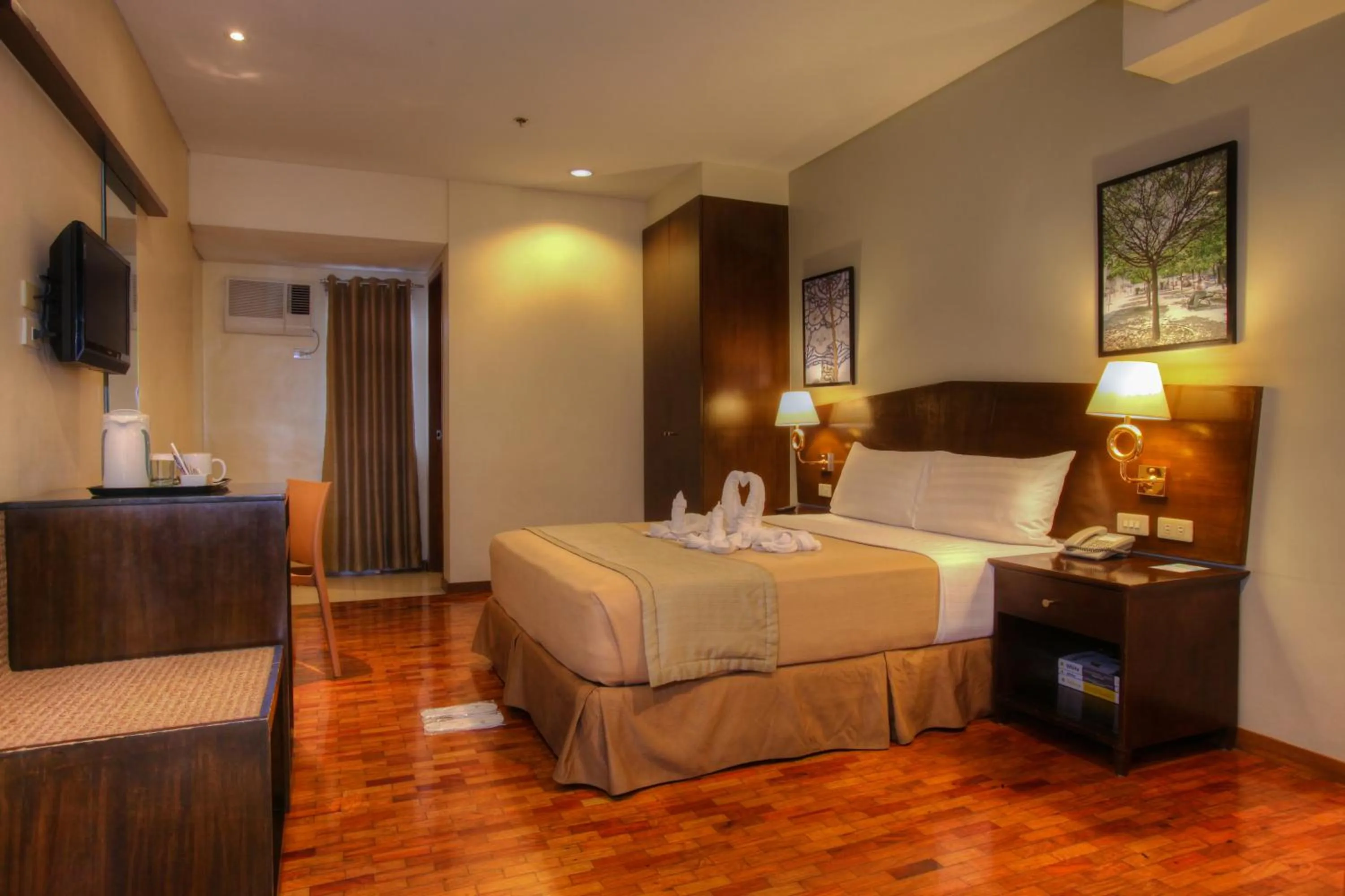 Photo of the whole room, Bed in Fersal Hotel Kalayaan, Quezon City
