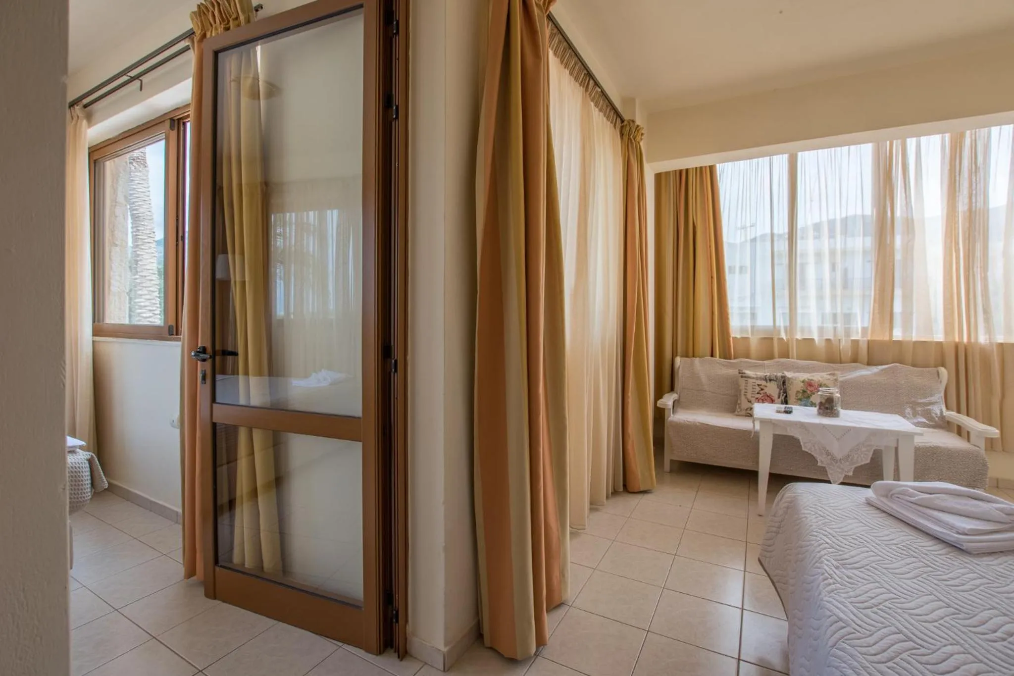 Seating area, Bed in Danelis Studios & Apartments