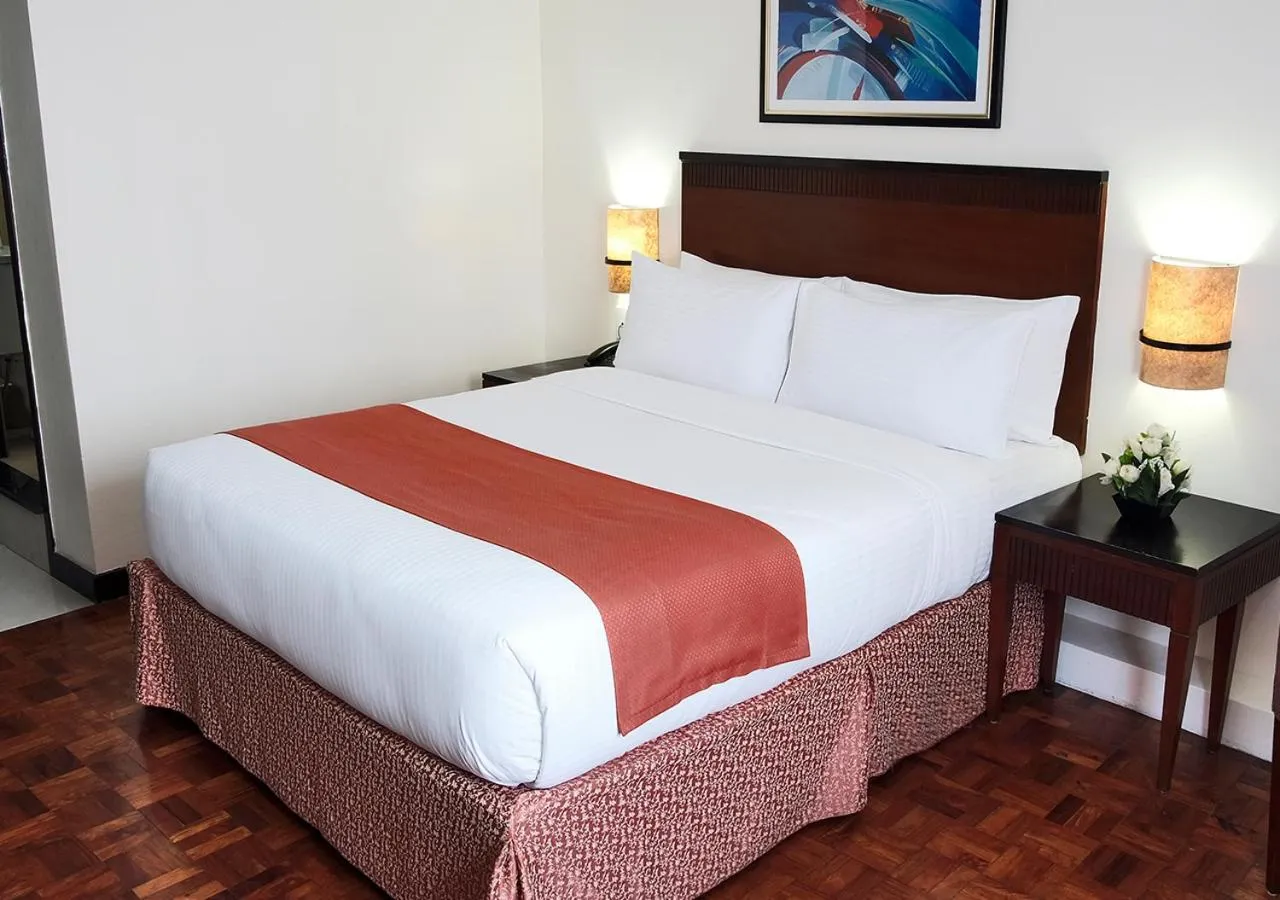 Bed in Fersal Hotel Neptune Makati