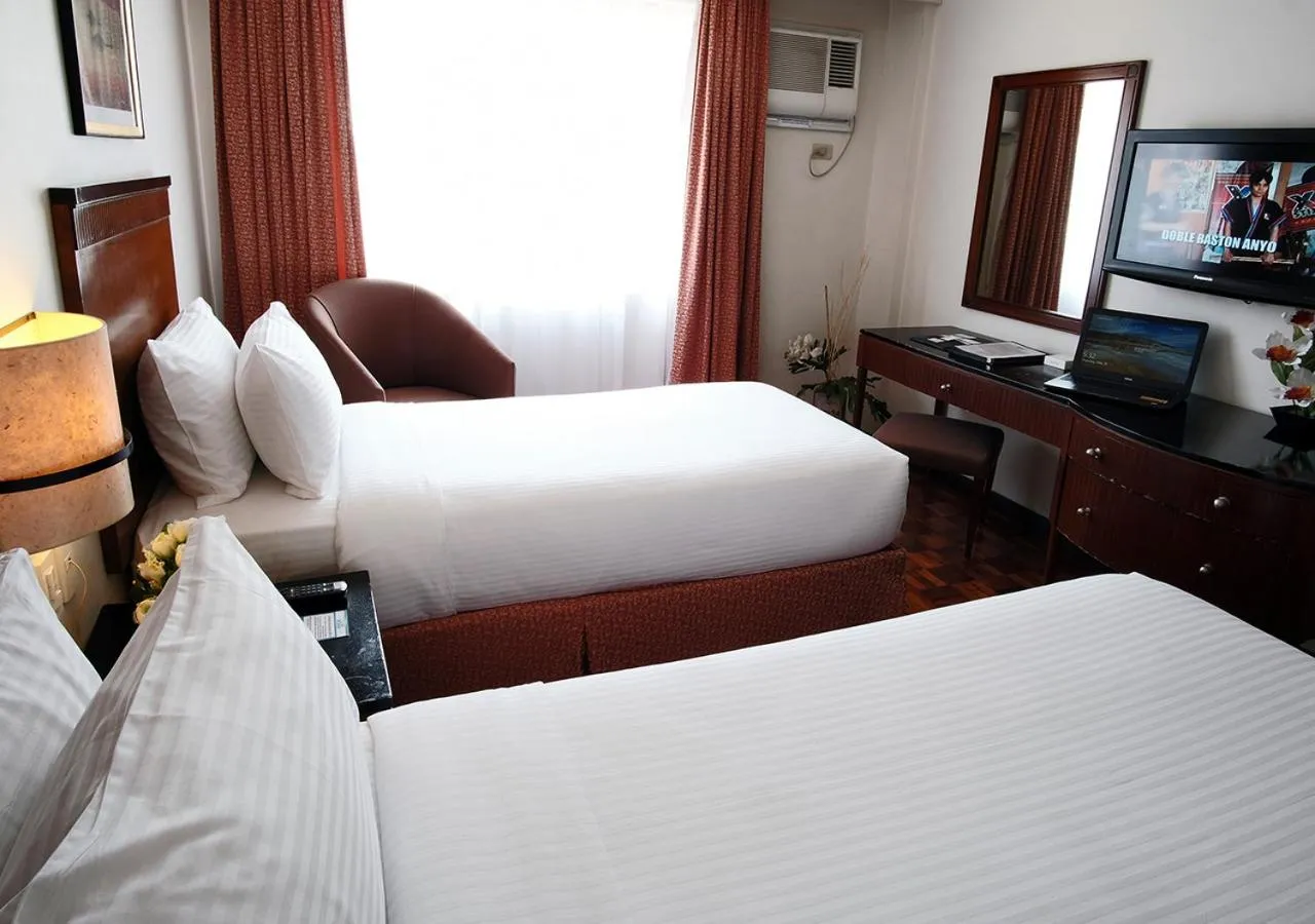 Bed in Fersal Hotel Neptune Makati