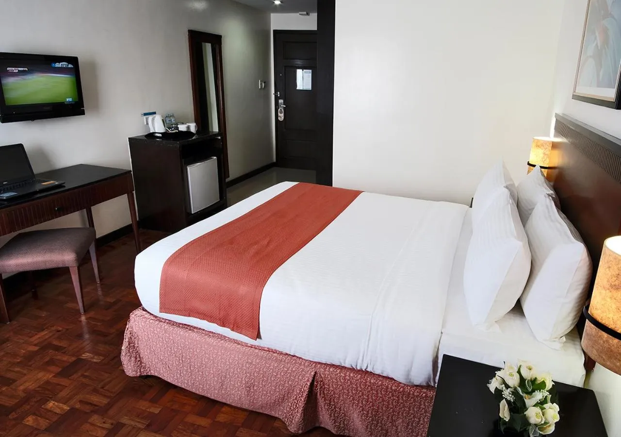 Bed in Fersal Hotel Neptune Makati