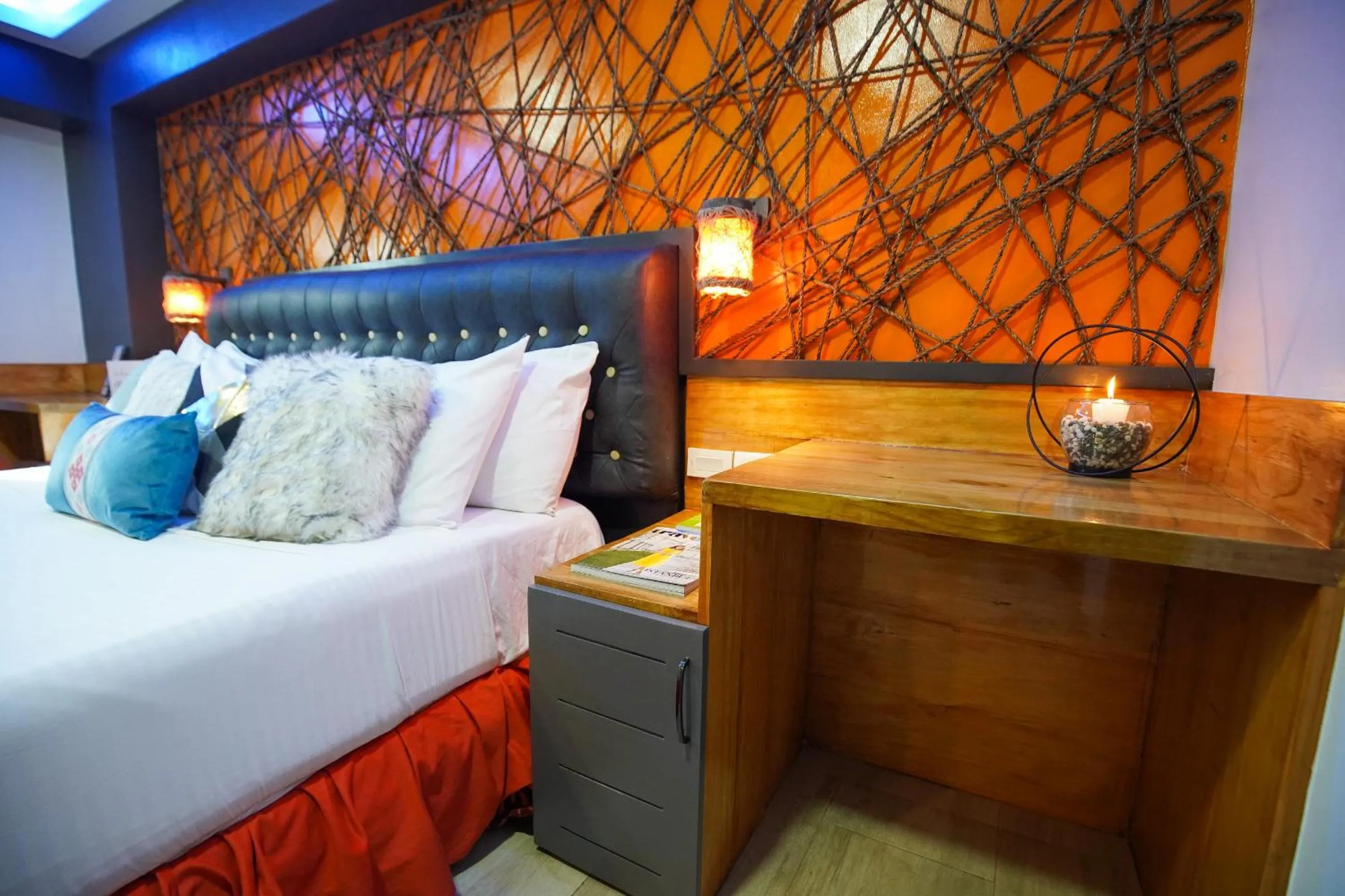 Bed in CLOCKWORKORANGE Luxury Suites