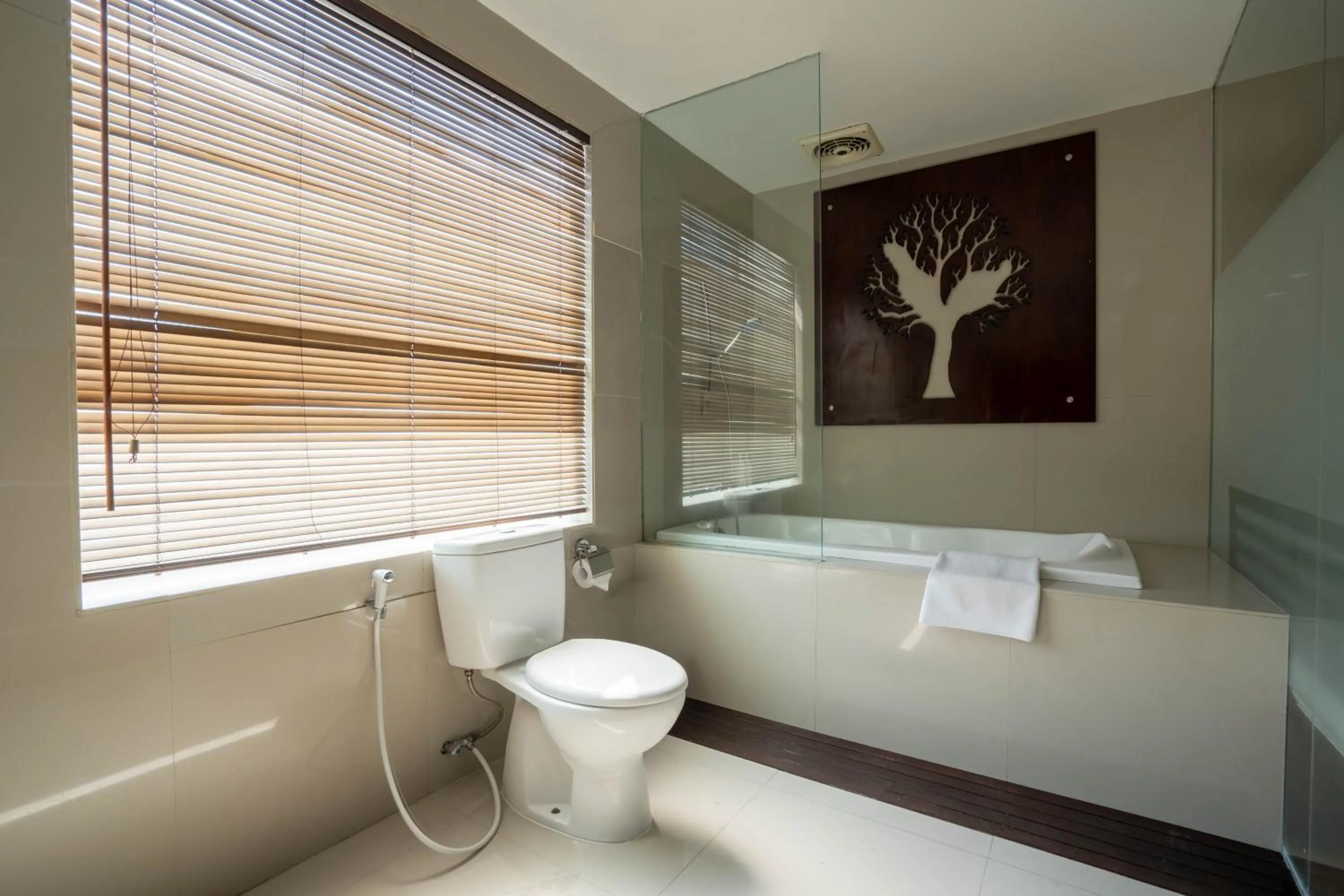 Shower in Swiss-Belcourt Sunset