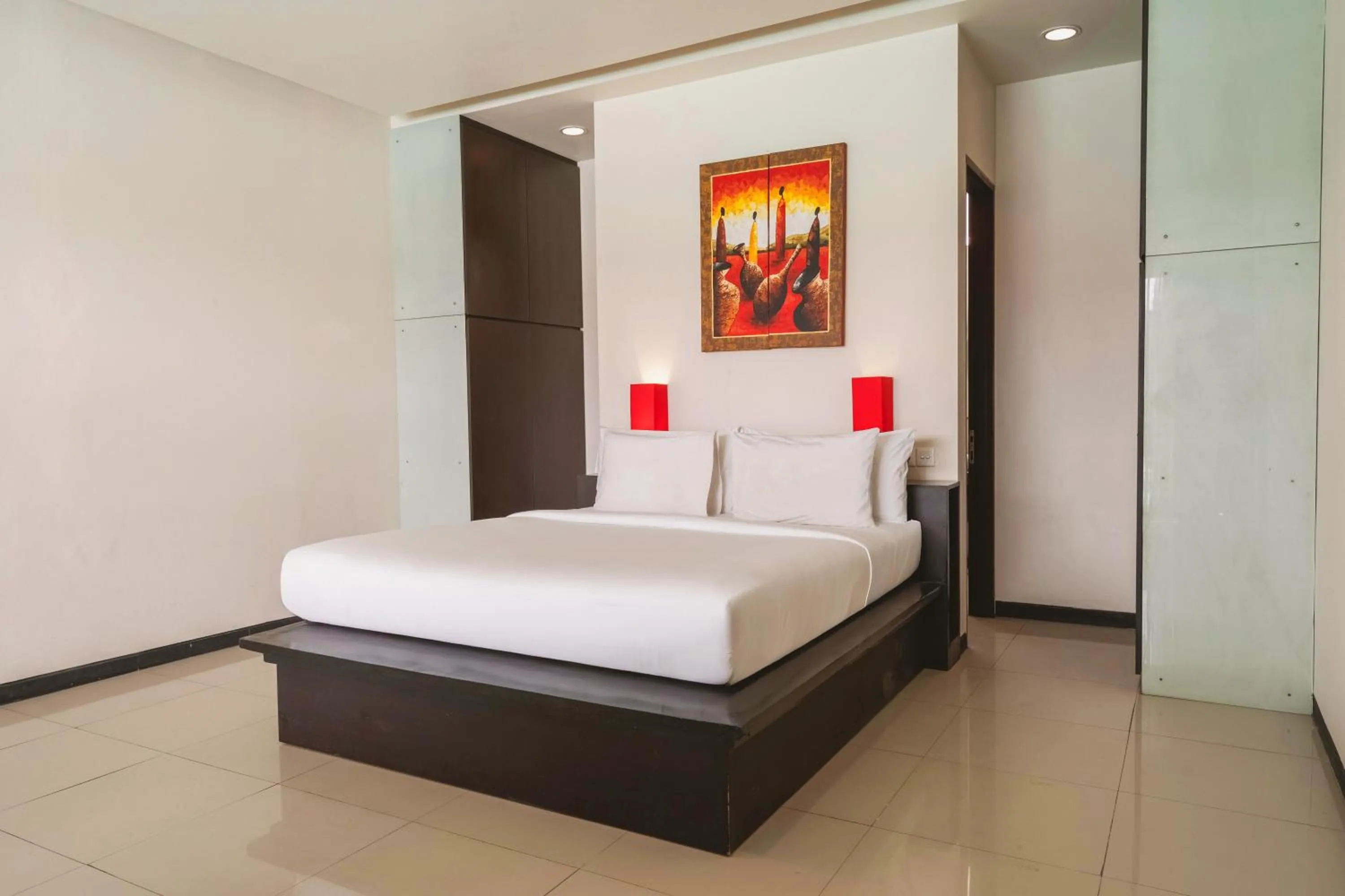 Bed in Swiss-Belcourt Sunset