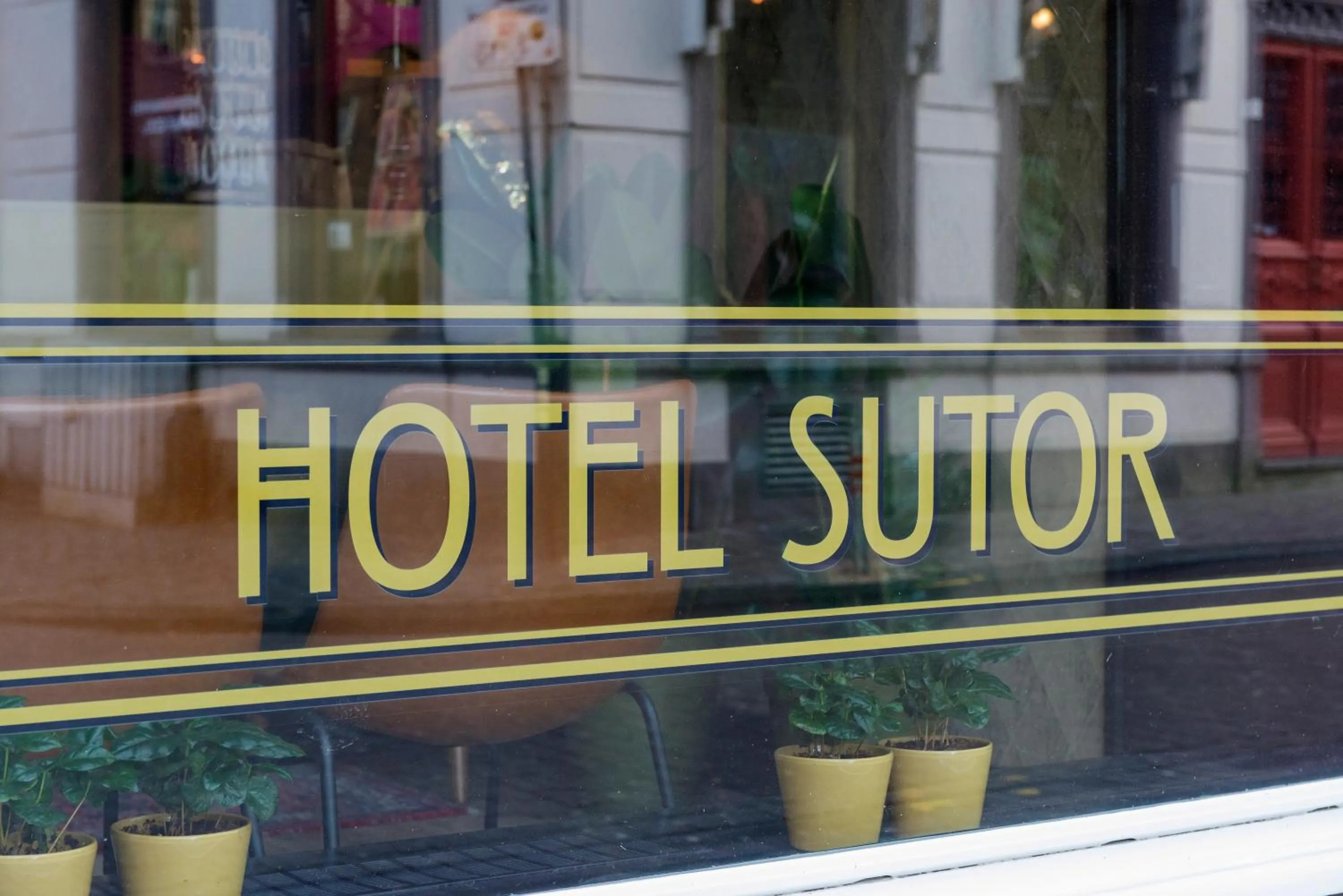 Property logo or sign in Hotel Sutor