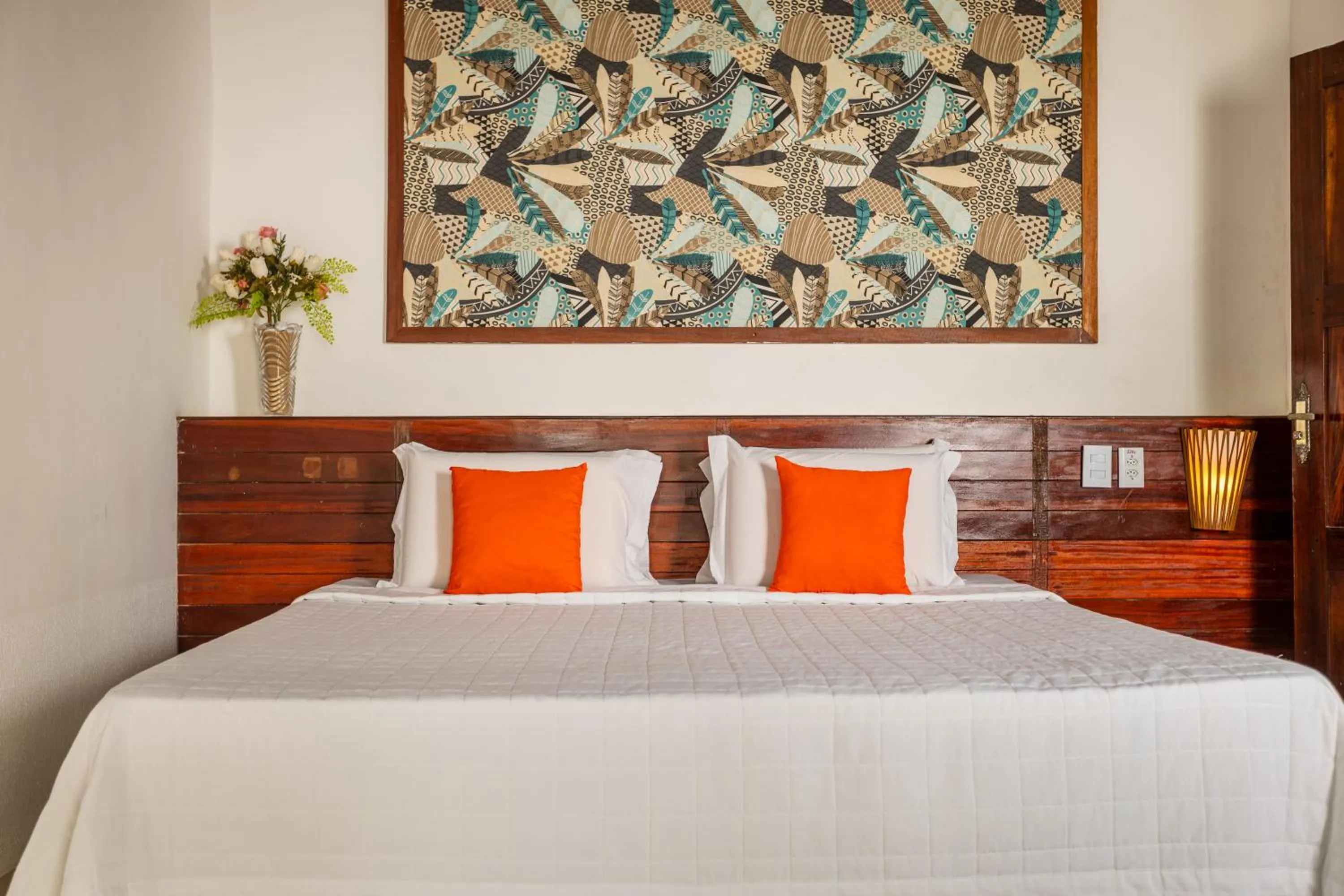 Bed in Jeri Village Hotel