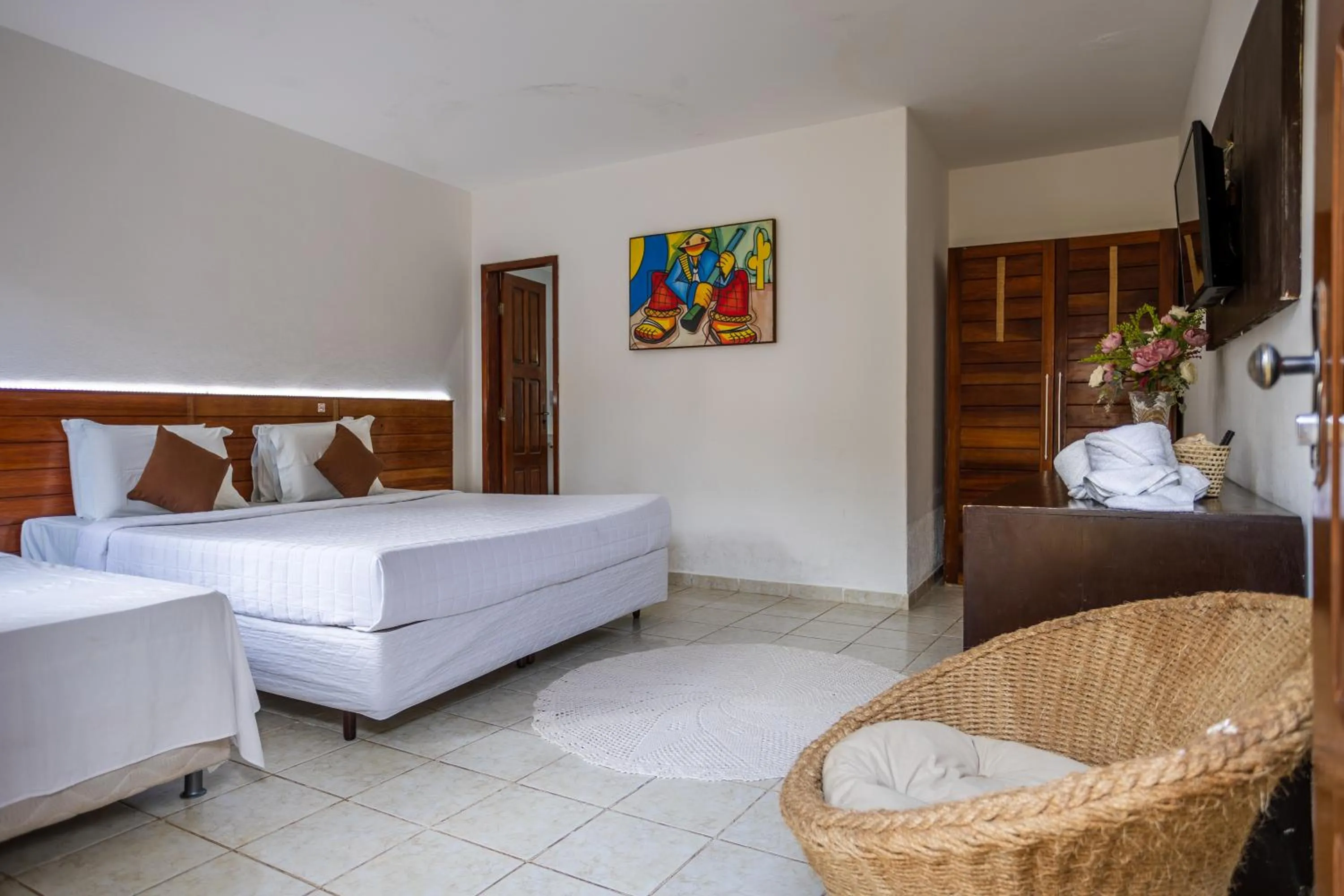 Bed in Jeri Village Hotel