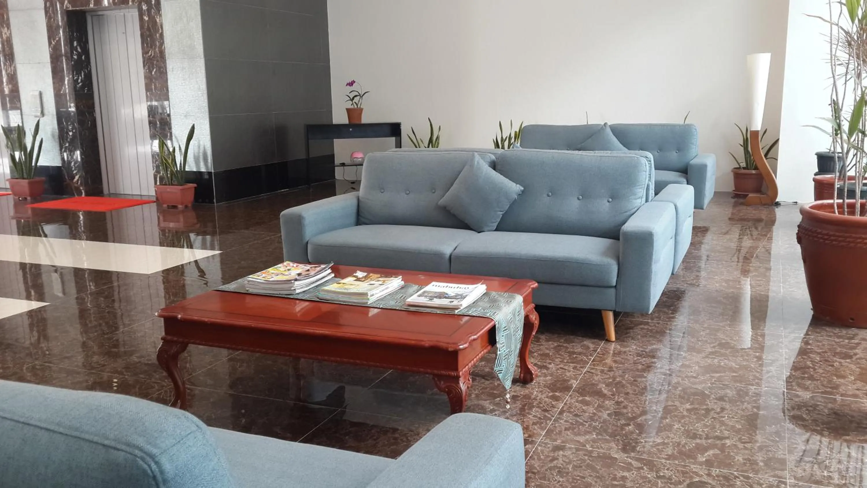 Seating area in YBC Grand Hotel