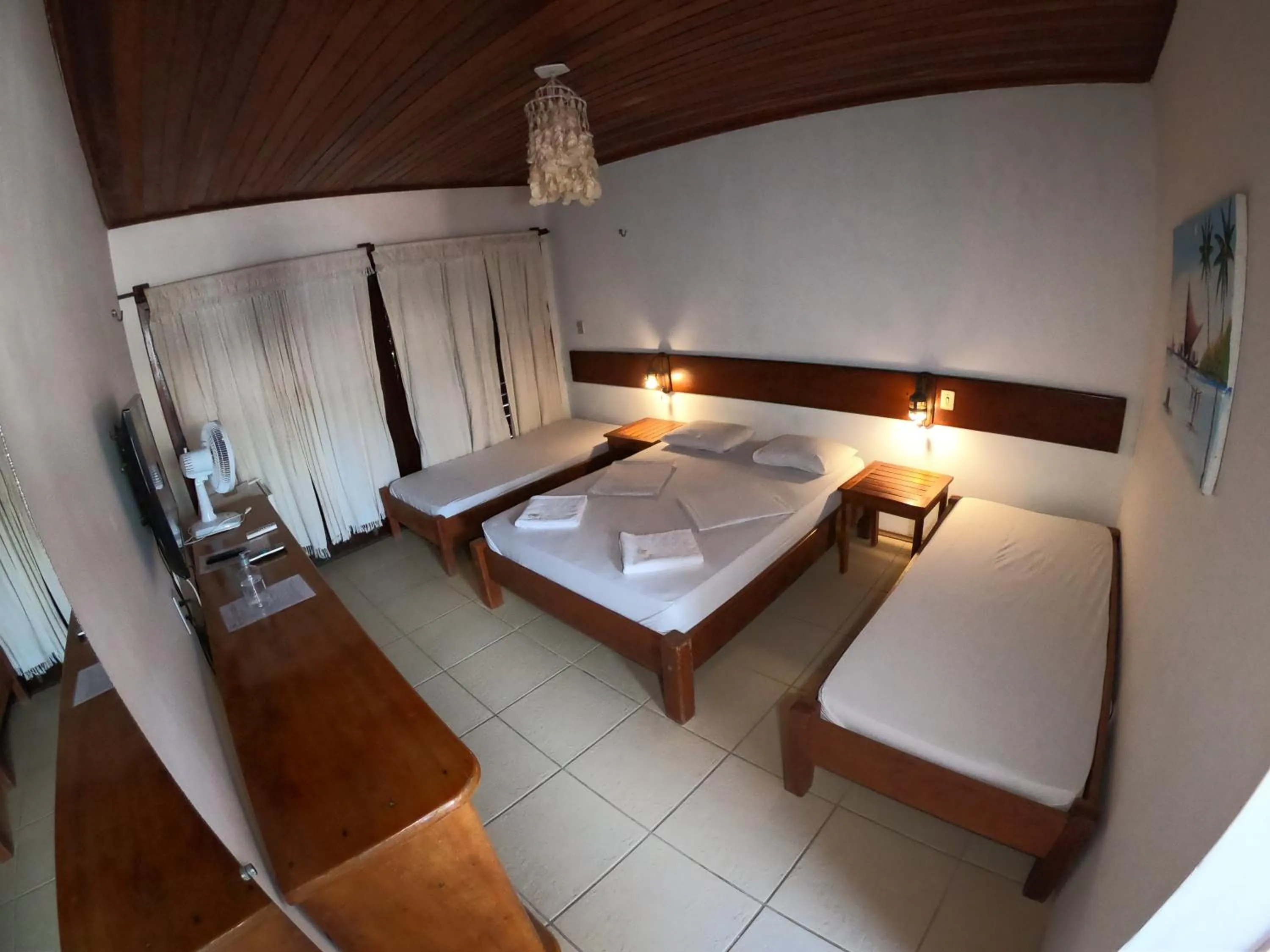 Bed in Pousada Casa Do Angelo