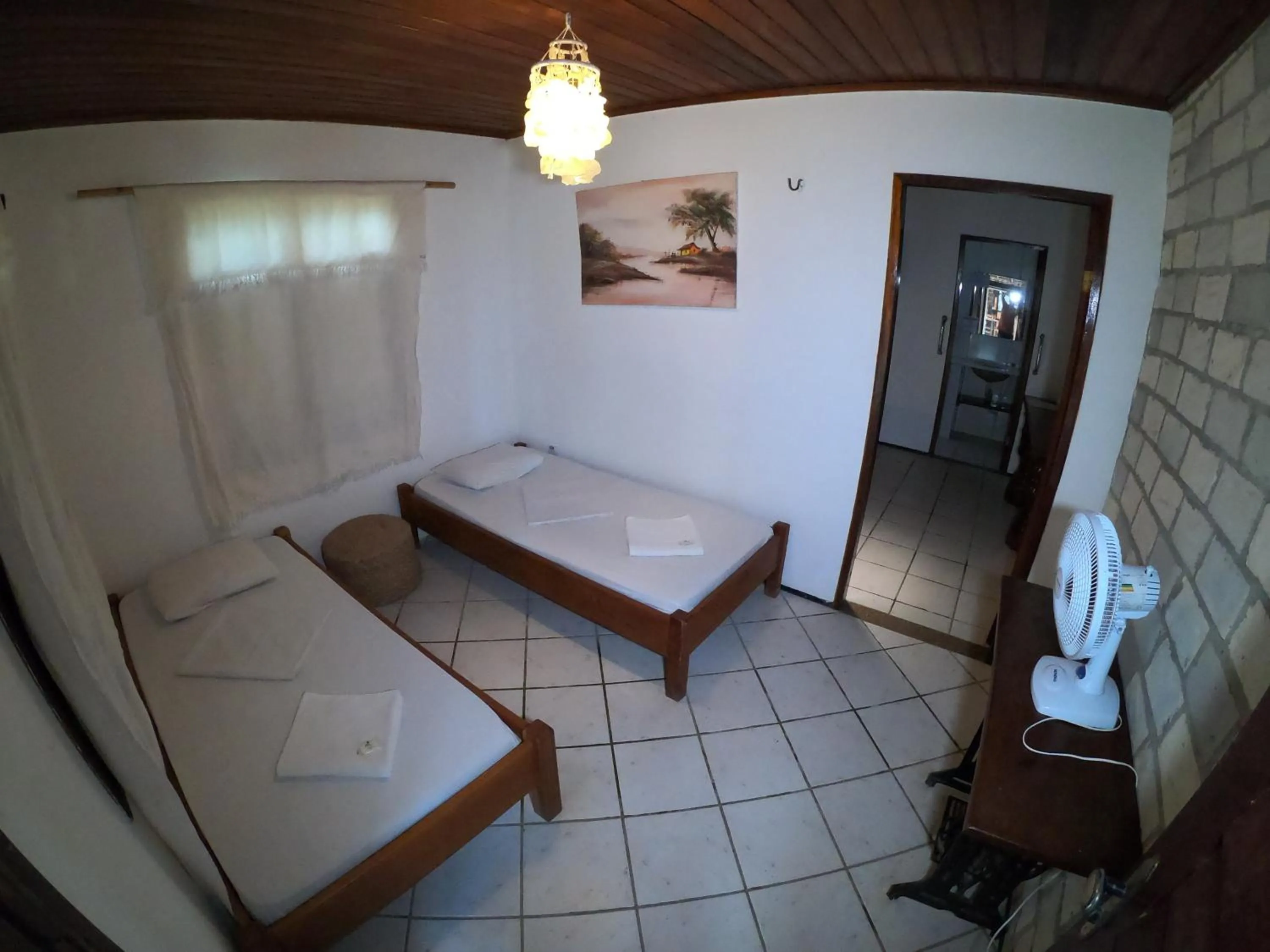 Bed in Pousada Casa Do Angelo