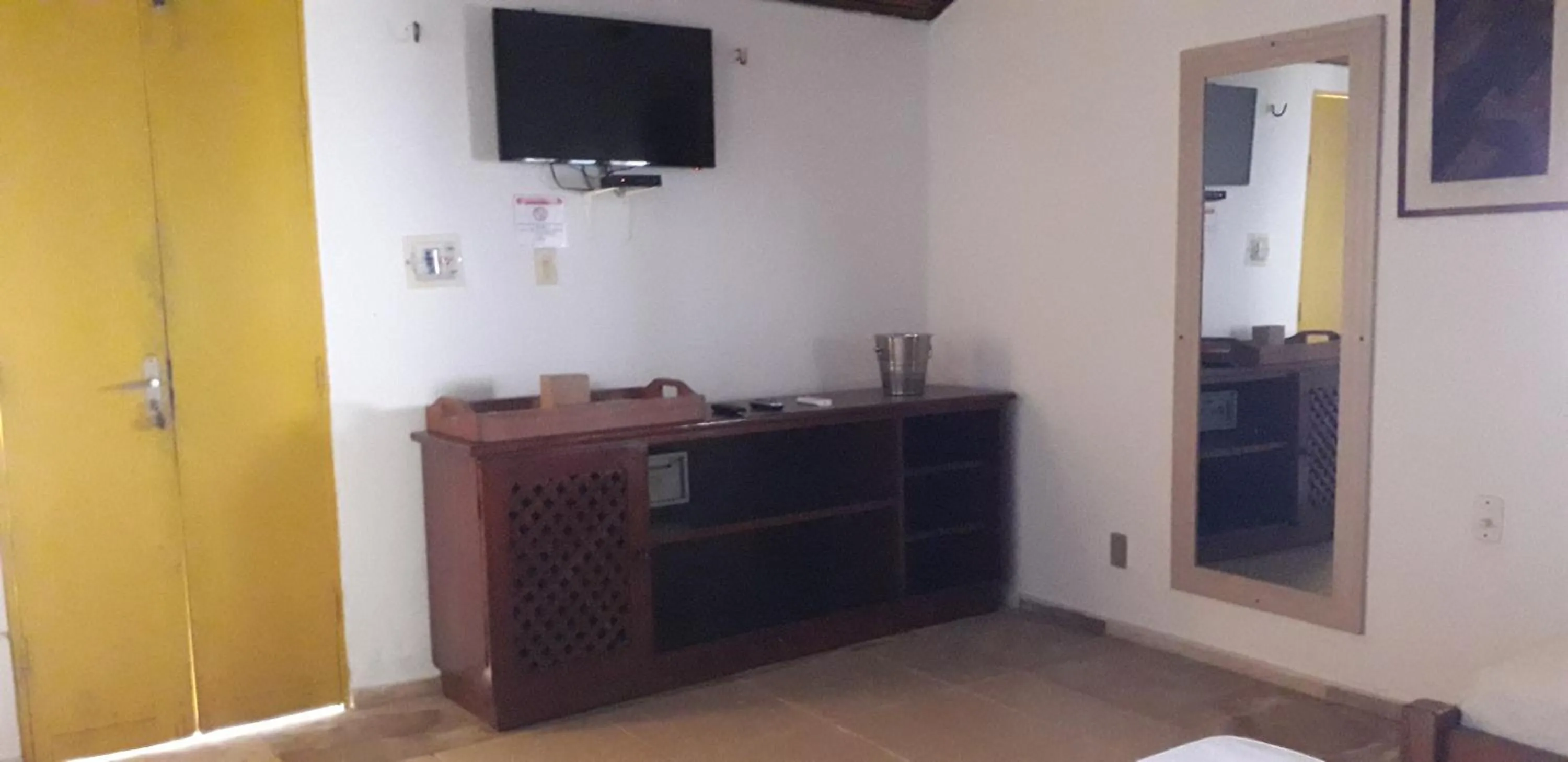 Bed in Pousada Casa Do Angelo