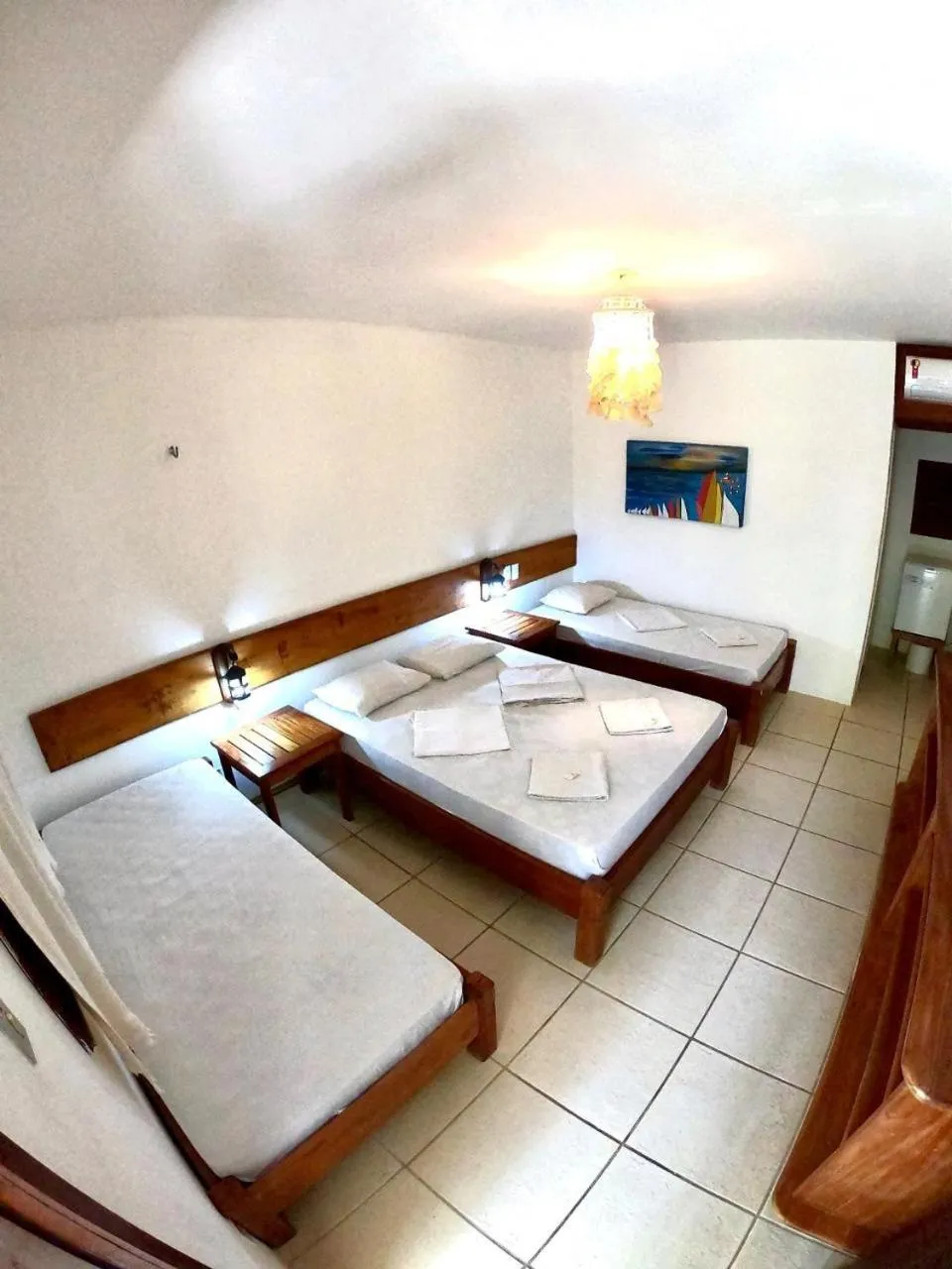 Bed in Pousada Casa Do Angelo