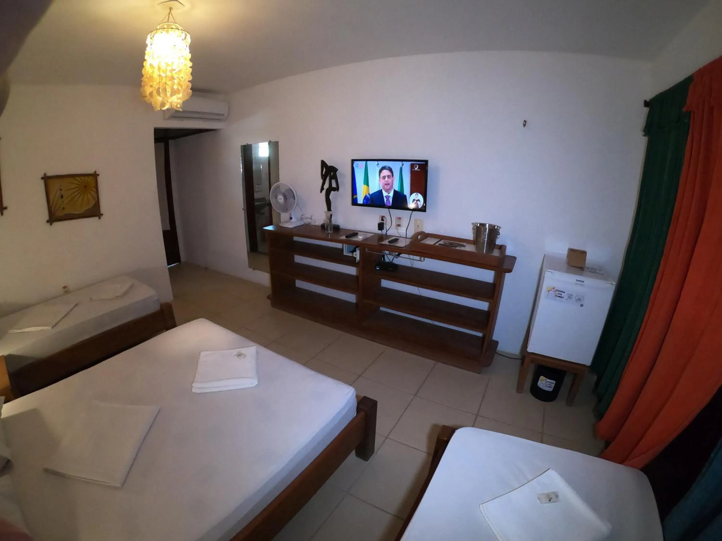 Bed in Pousada Casa Do Angelo